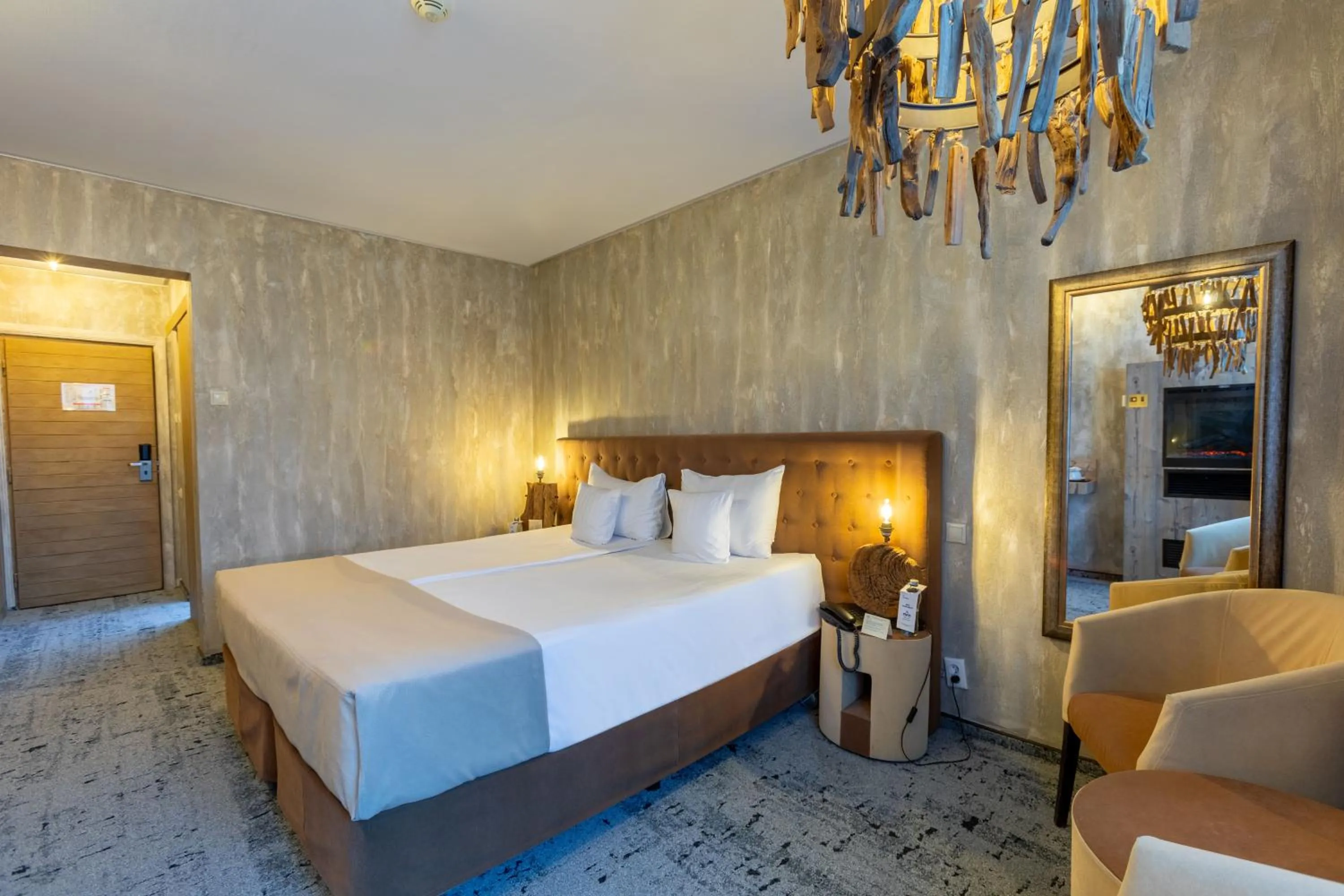 Bed in Alpin Resort Hotel