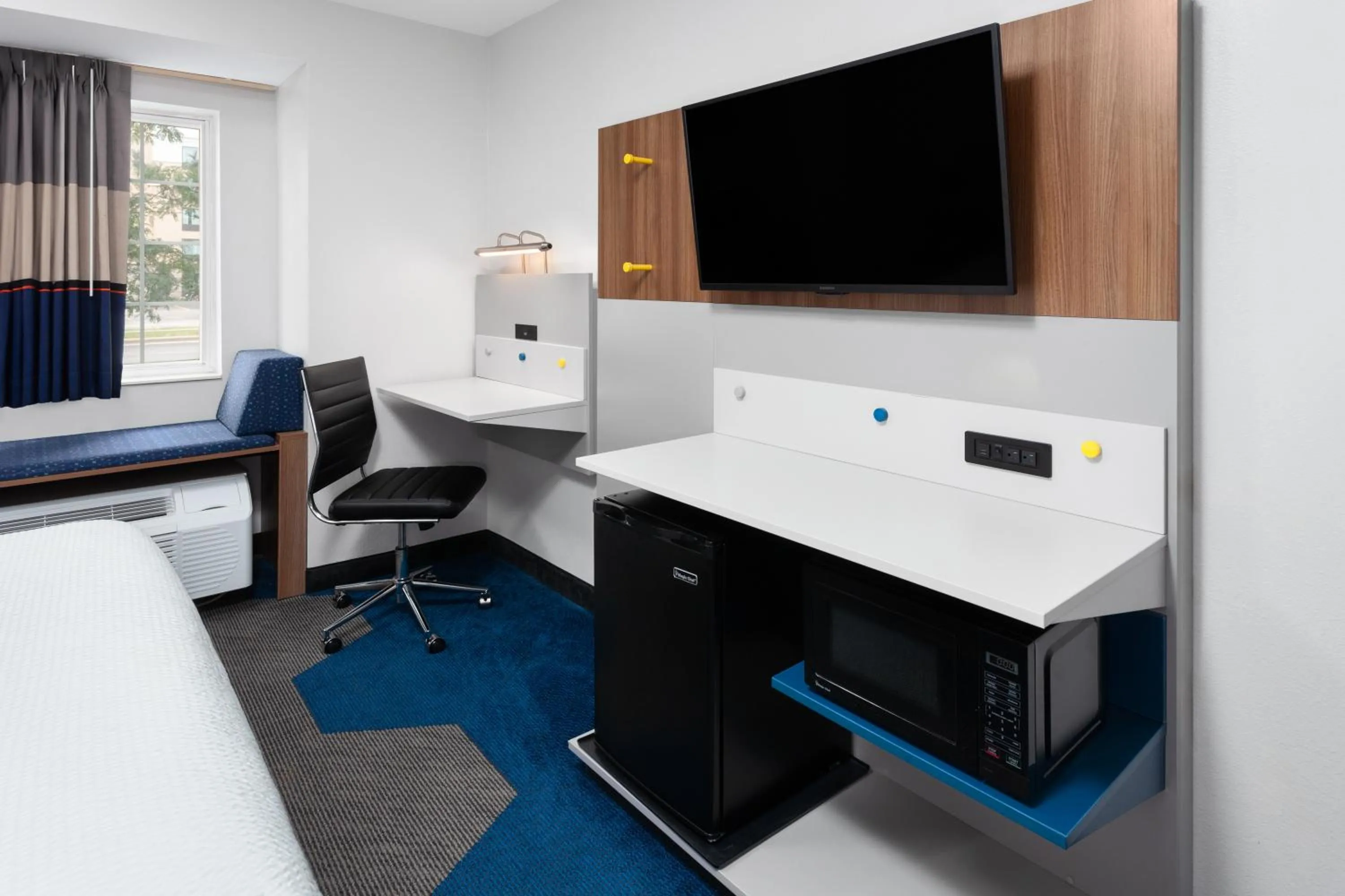 Bed in Microtel Inn by Wyndham Janesville