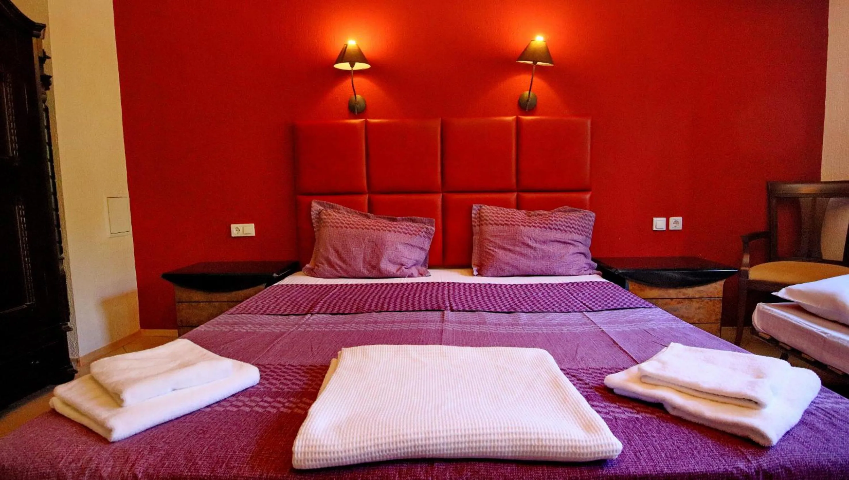 Bed in Elli Greco Hotel
