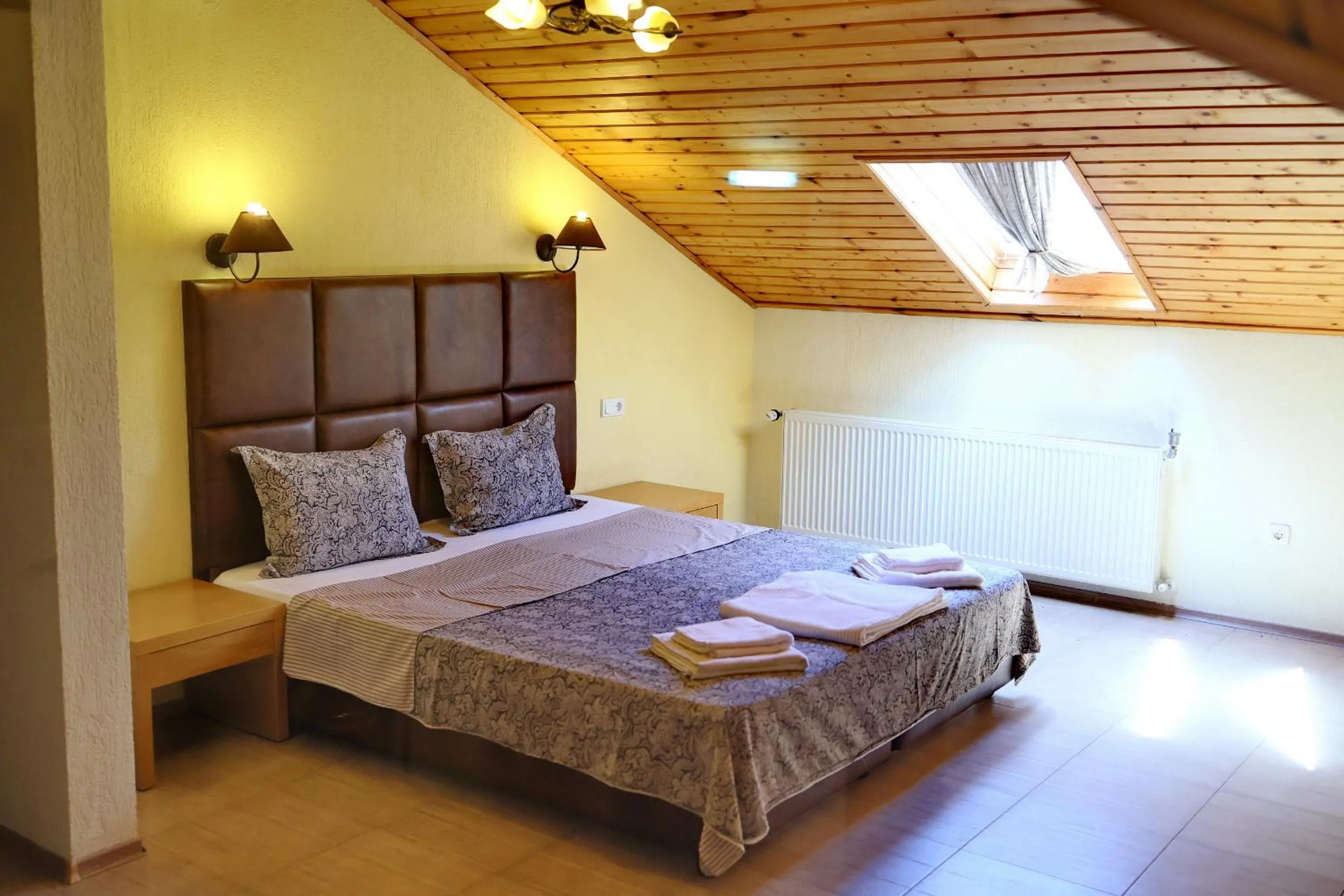 Bed in Elli Greco Hotel