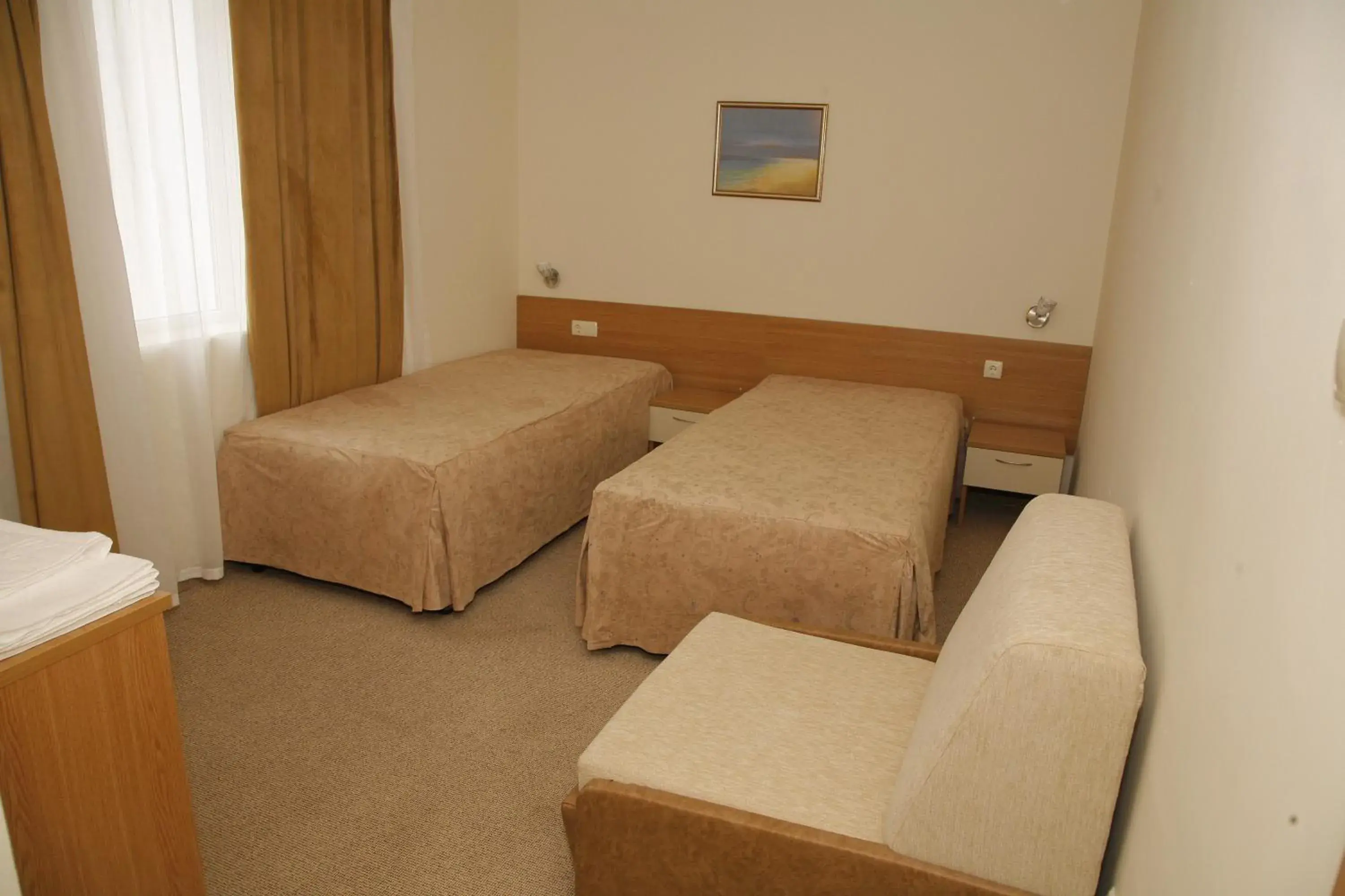 Triple Room in Melsa COOP Hotel Triple Room in Melsa COOP Hotel