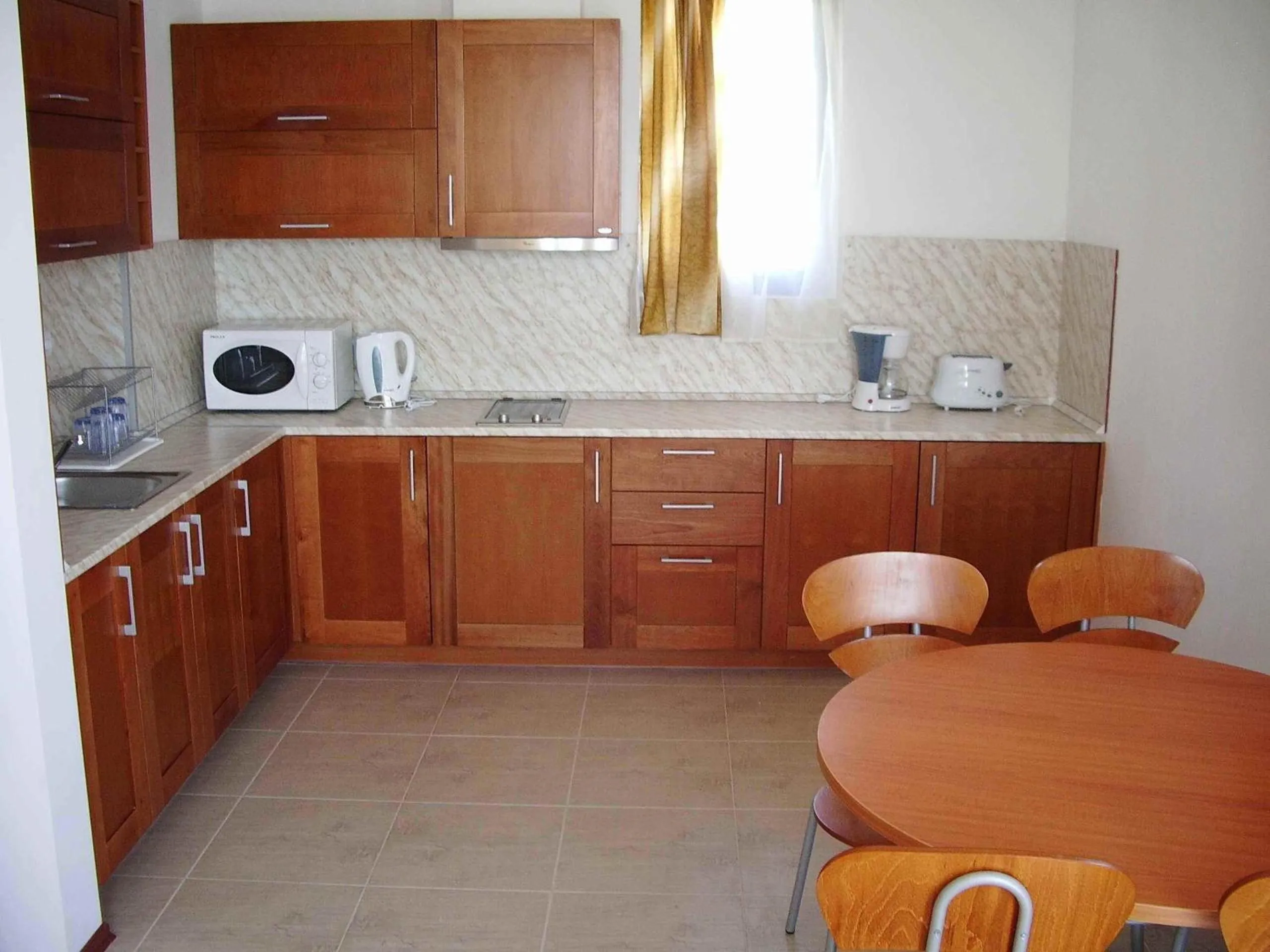 Kitchen or kitchenette in Bay View Villas - Luxury Villas & Apartments