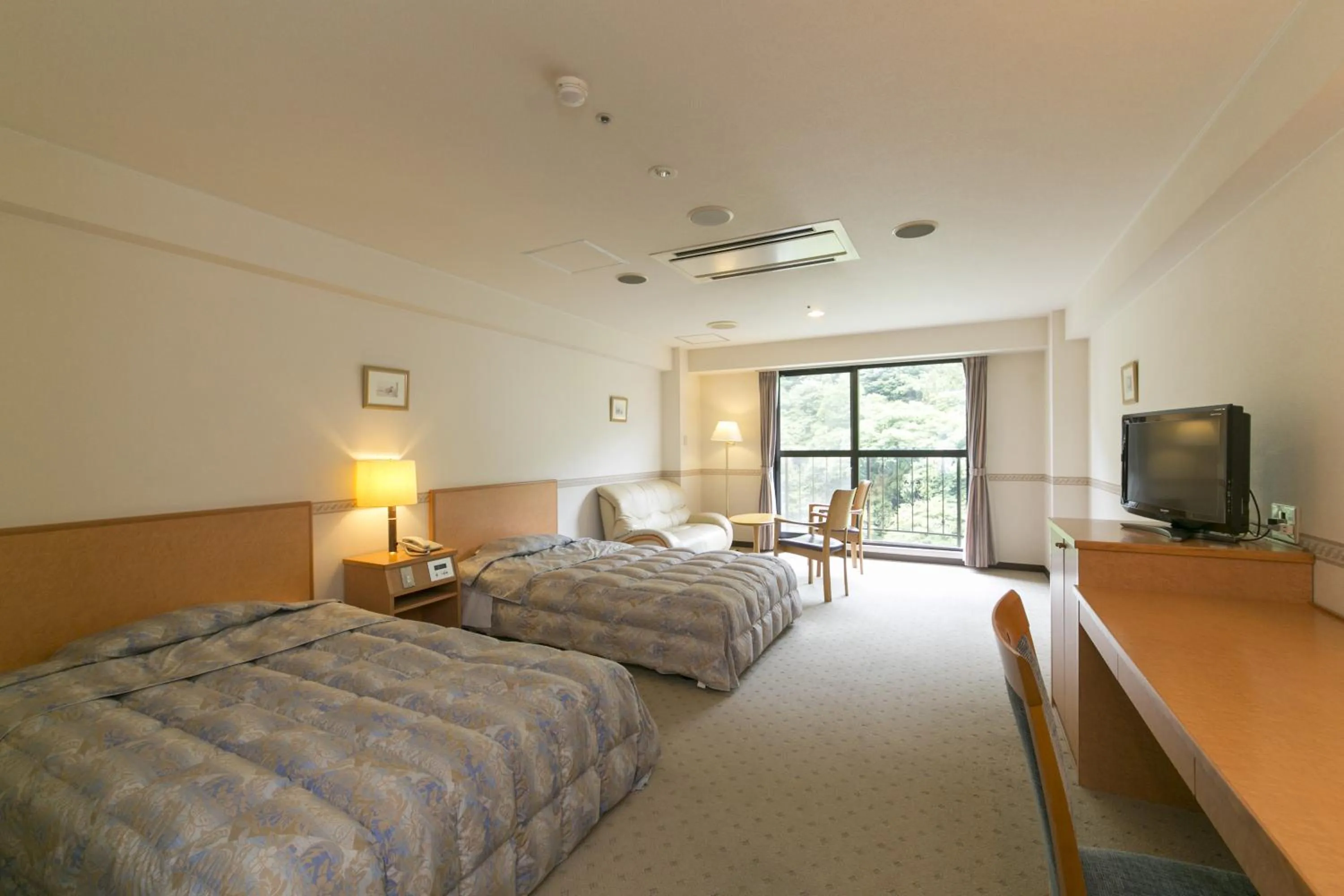 Photo of the whole room, Bed in Okuhida Garden Hotel Yakedake