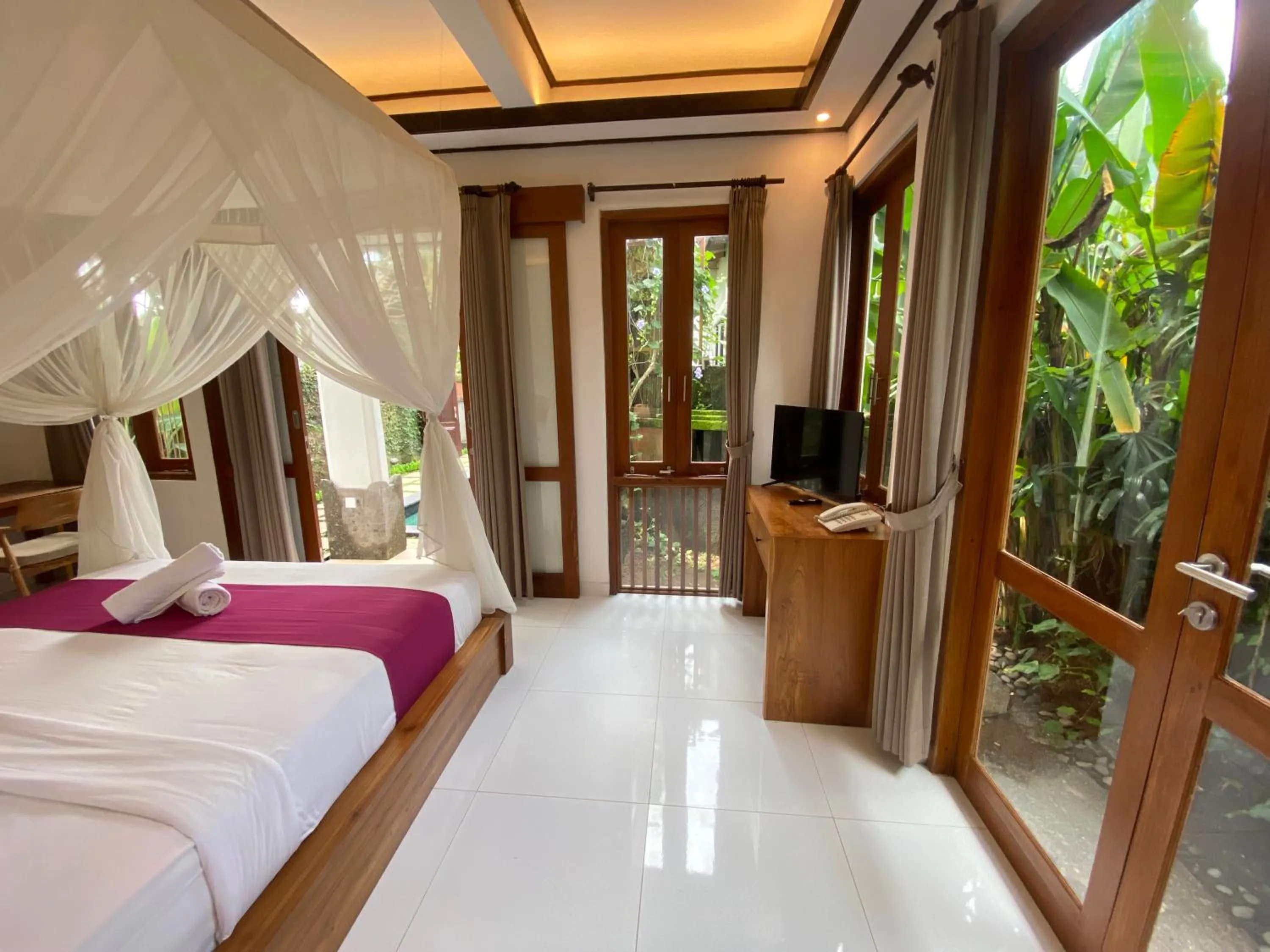 Bed in Gusde Tranquil Villas by EPS