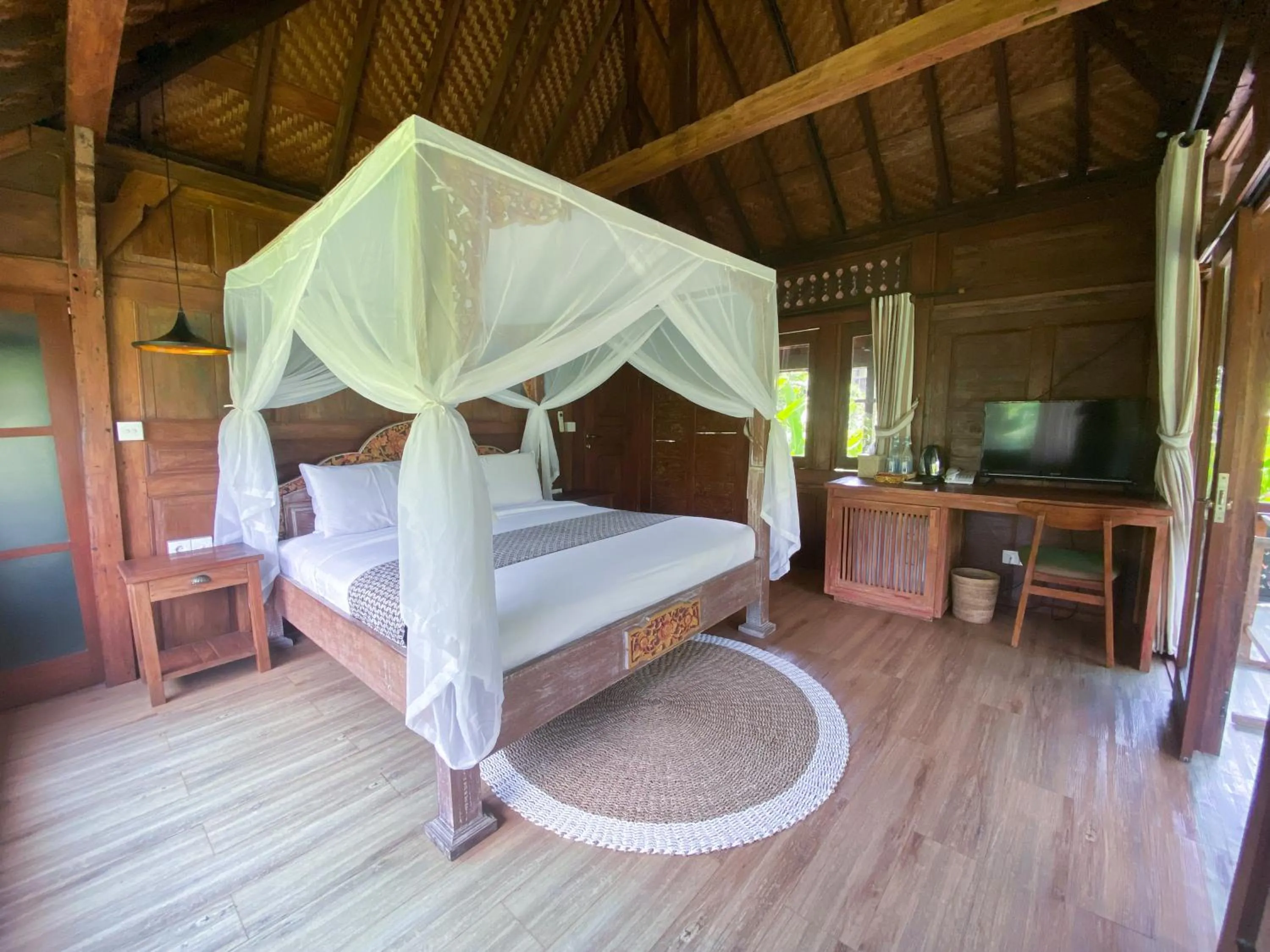 Bed in Gusde Tranquil Villas by EPS