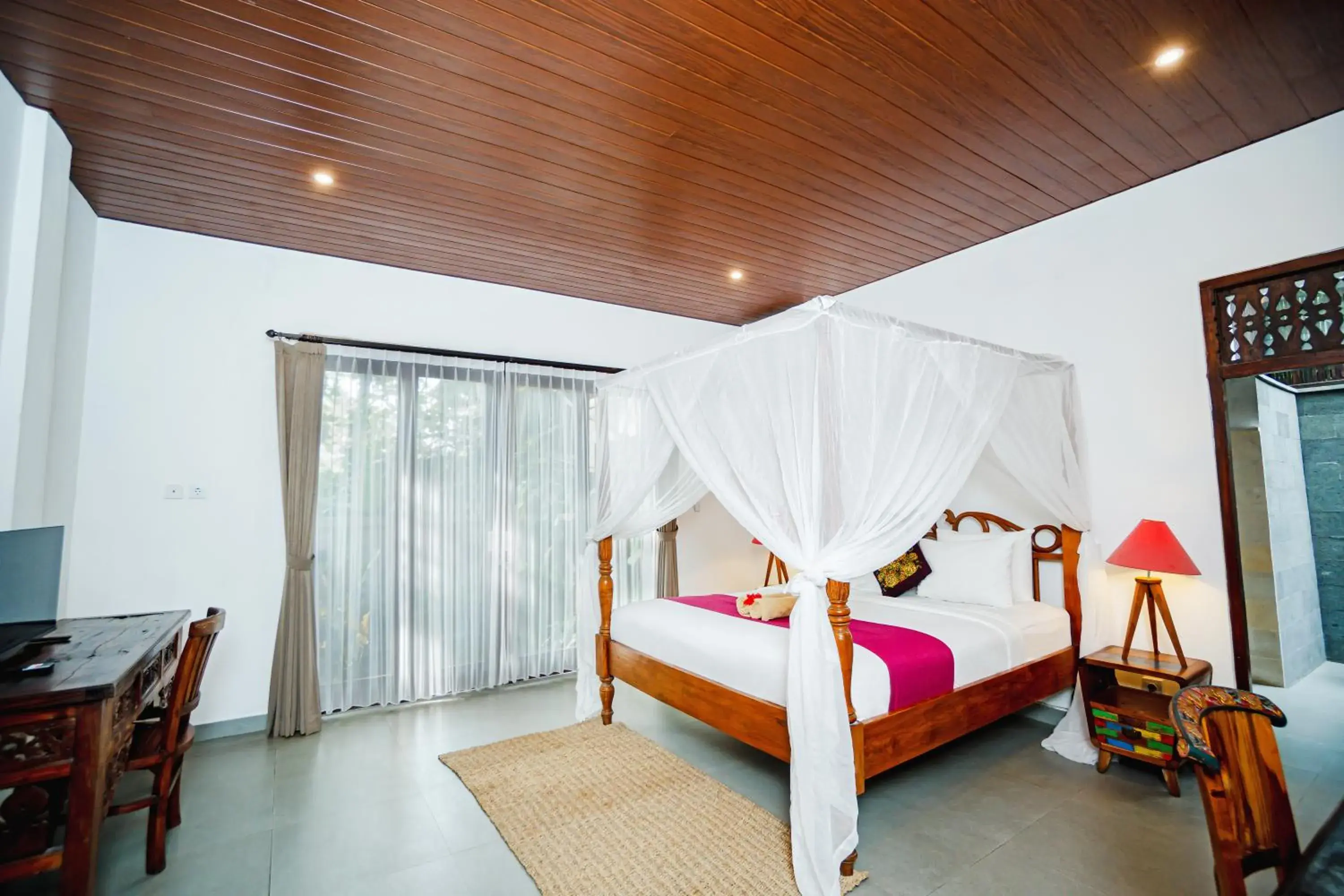 Bed in Gusde Tranquil Villas by EPS Bed in Gusde Tranquil Villas by EPS