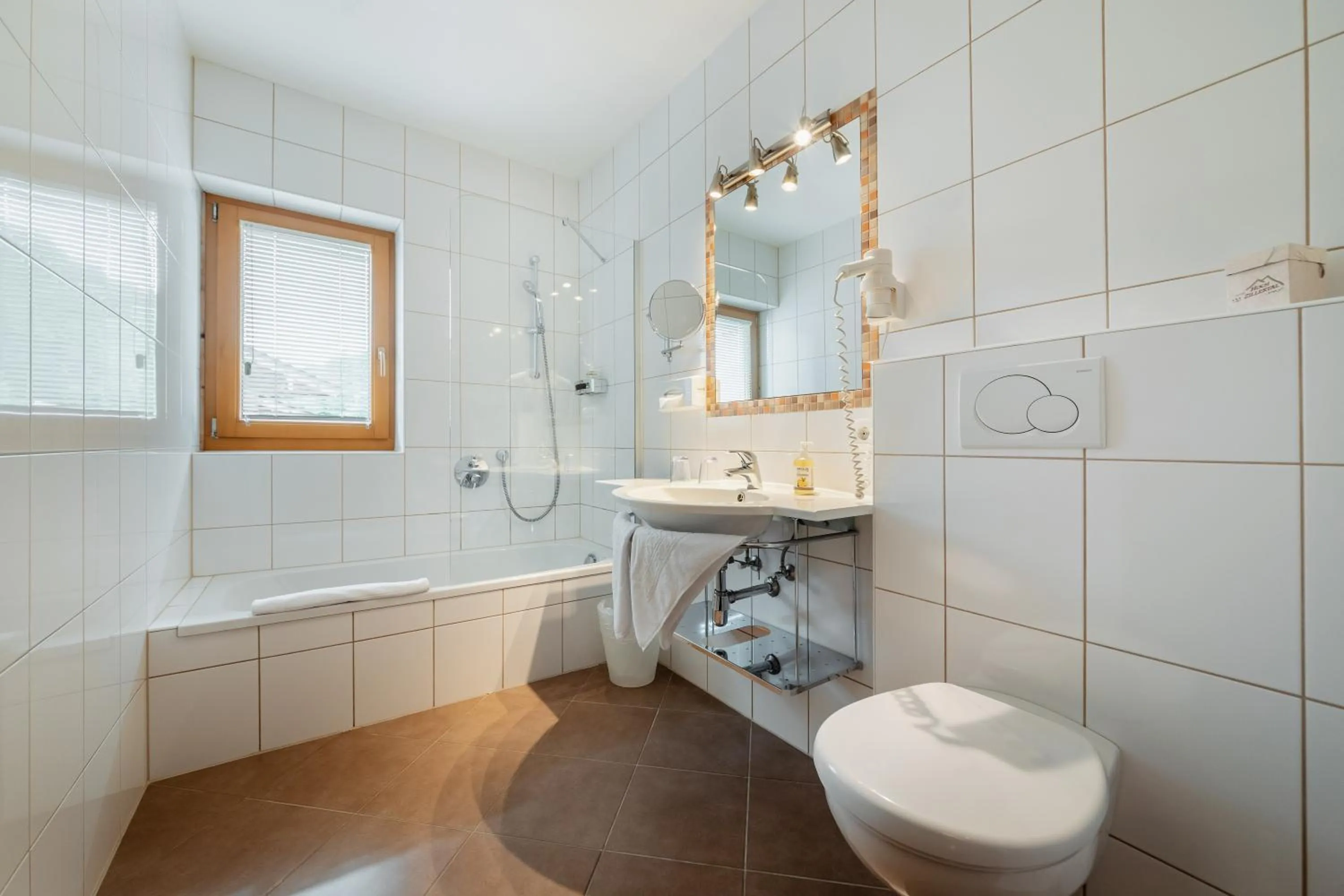 Bathroom in Kräuterhotel Hochzillertal