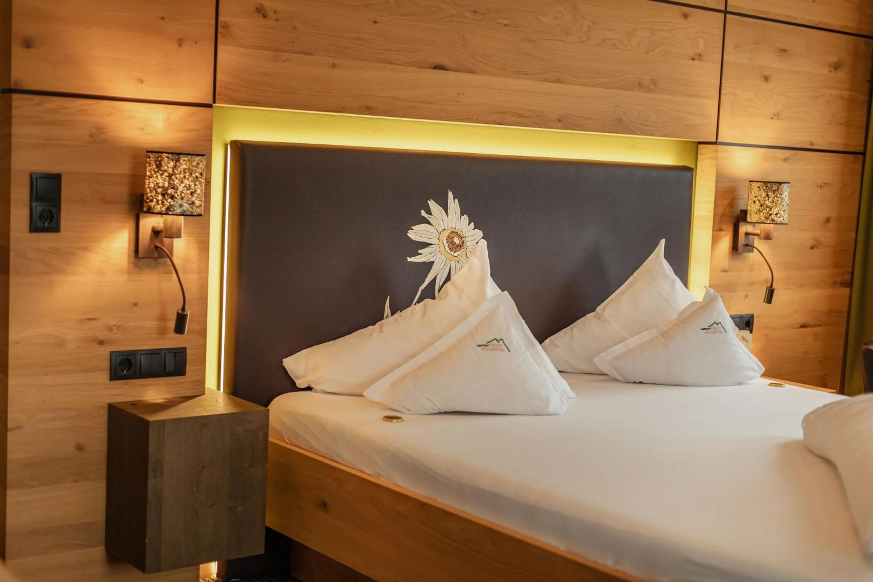 Bed in Kräuterhotel Hochzillertal