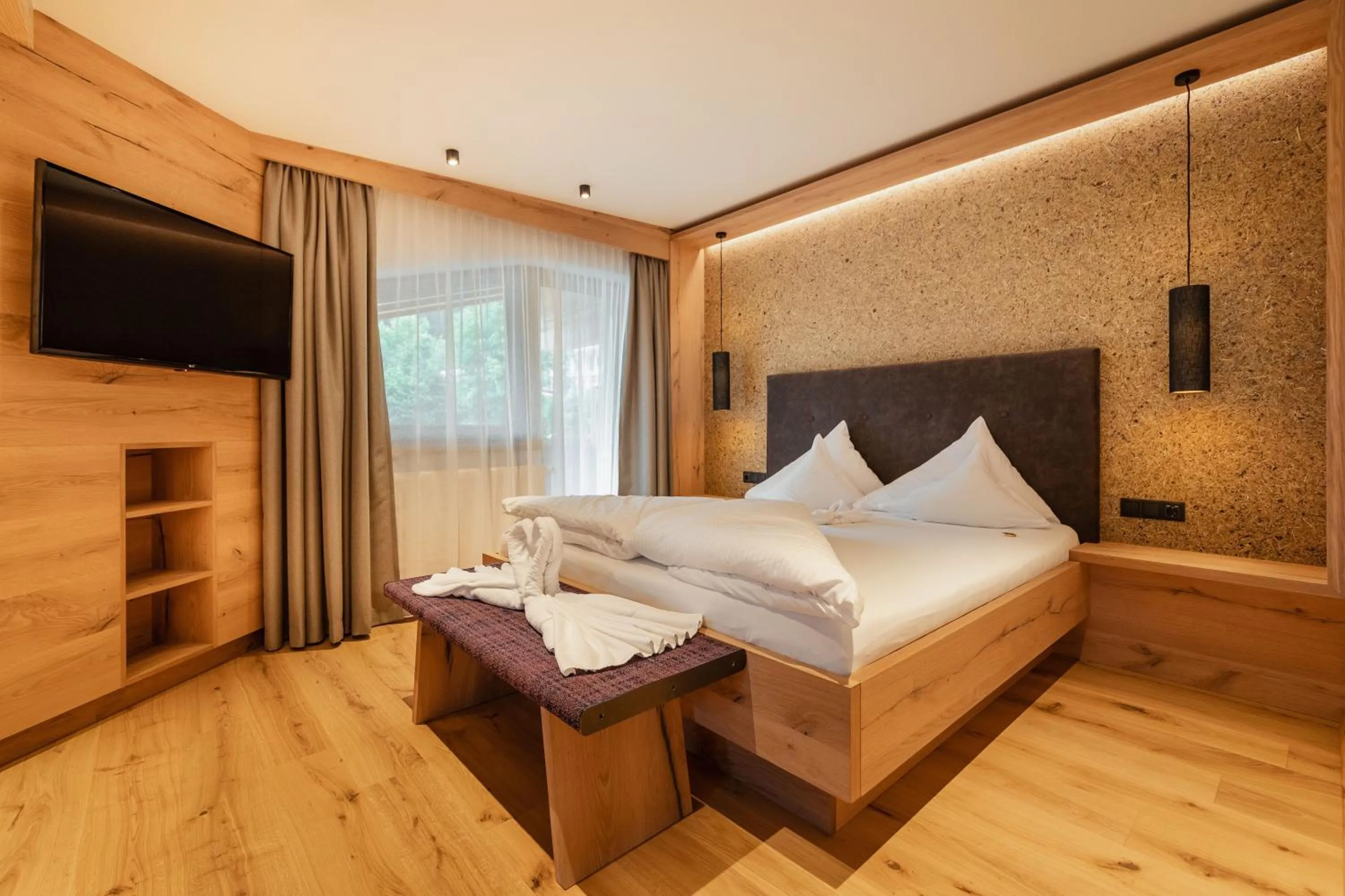 Photo of the whole room, Bed in Kräuterhotel Hochzillertal