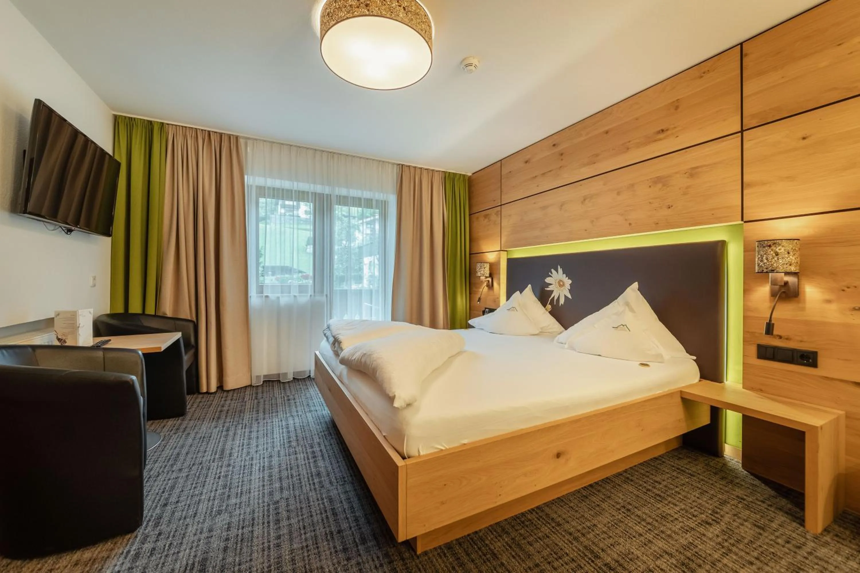 Bed in Kräuterhotel Hochzillertal