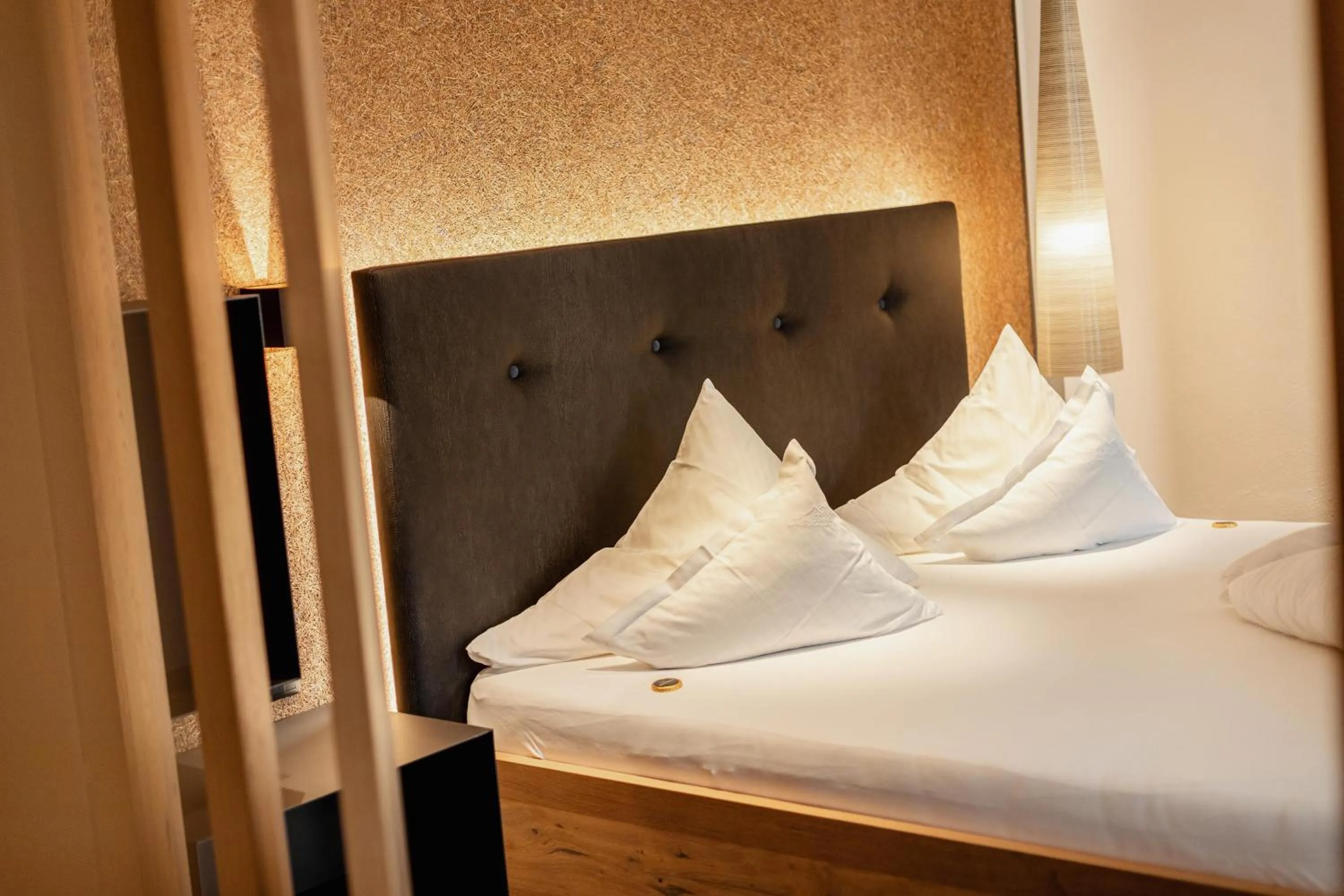 Bed in Kräuterhotel Hochzillertal