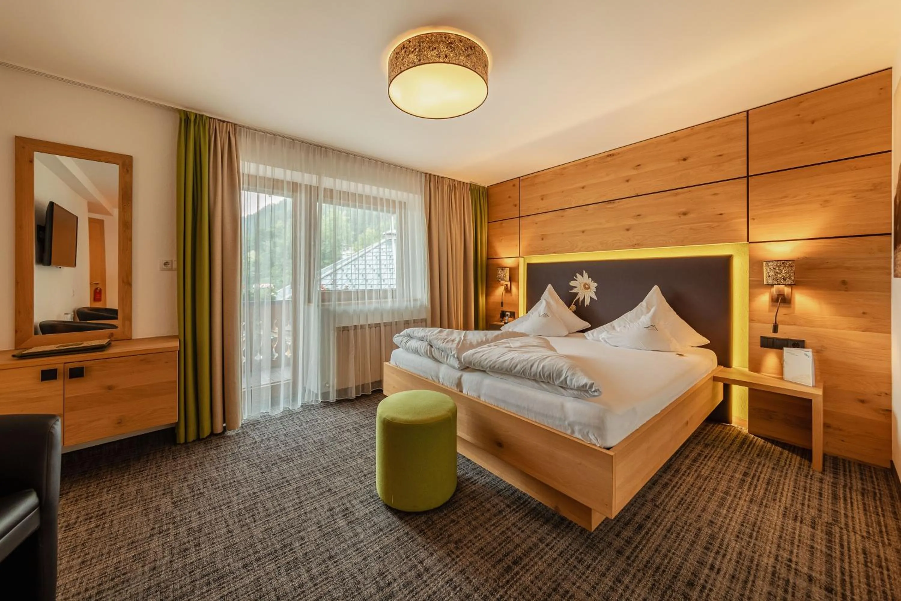 Bed in Kräuterhotel Hochzillertal