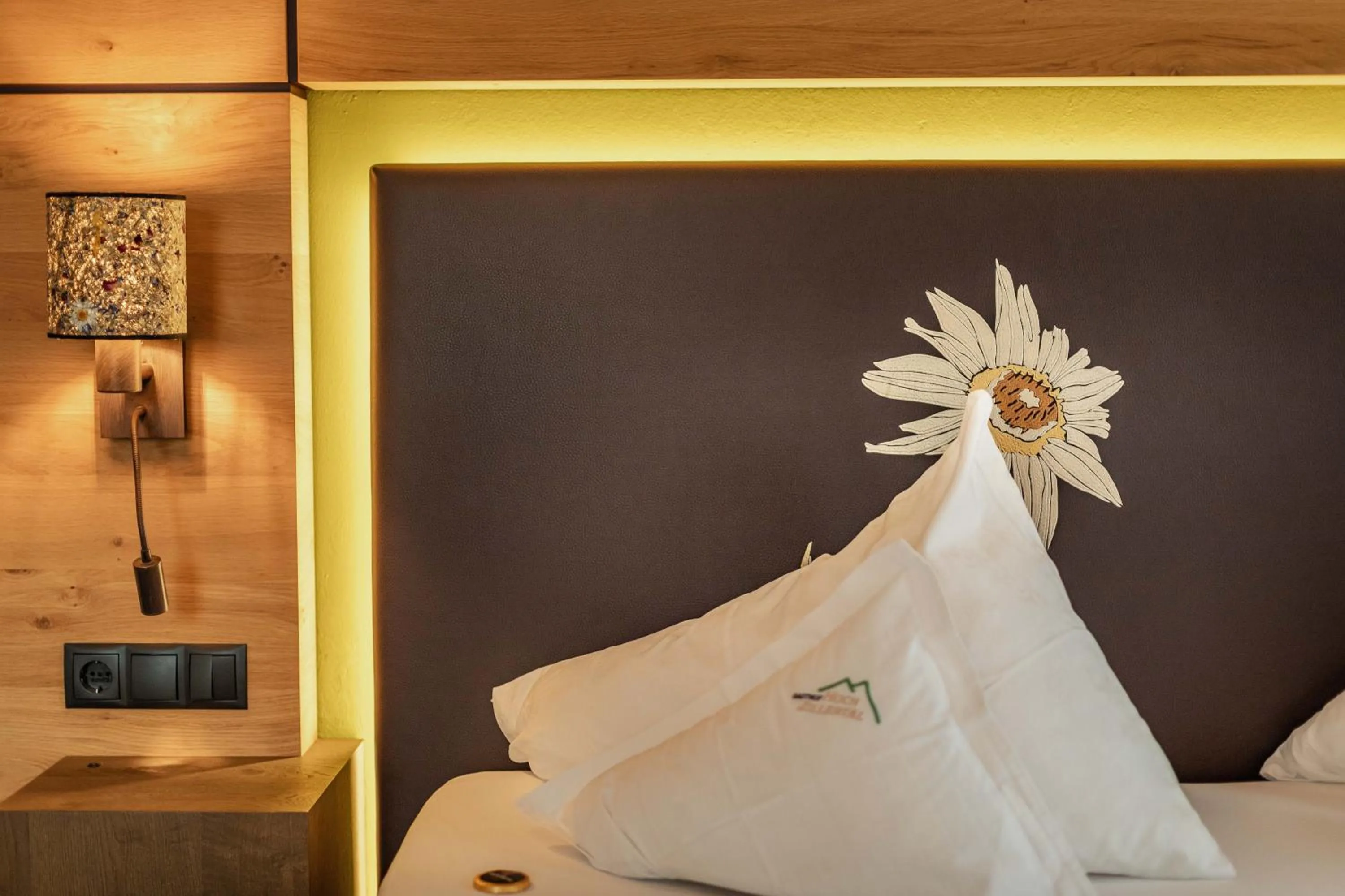 Bed in Kräuterhotel Hochzillertal