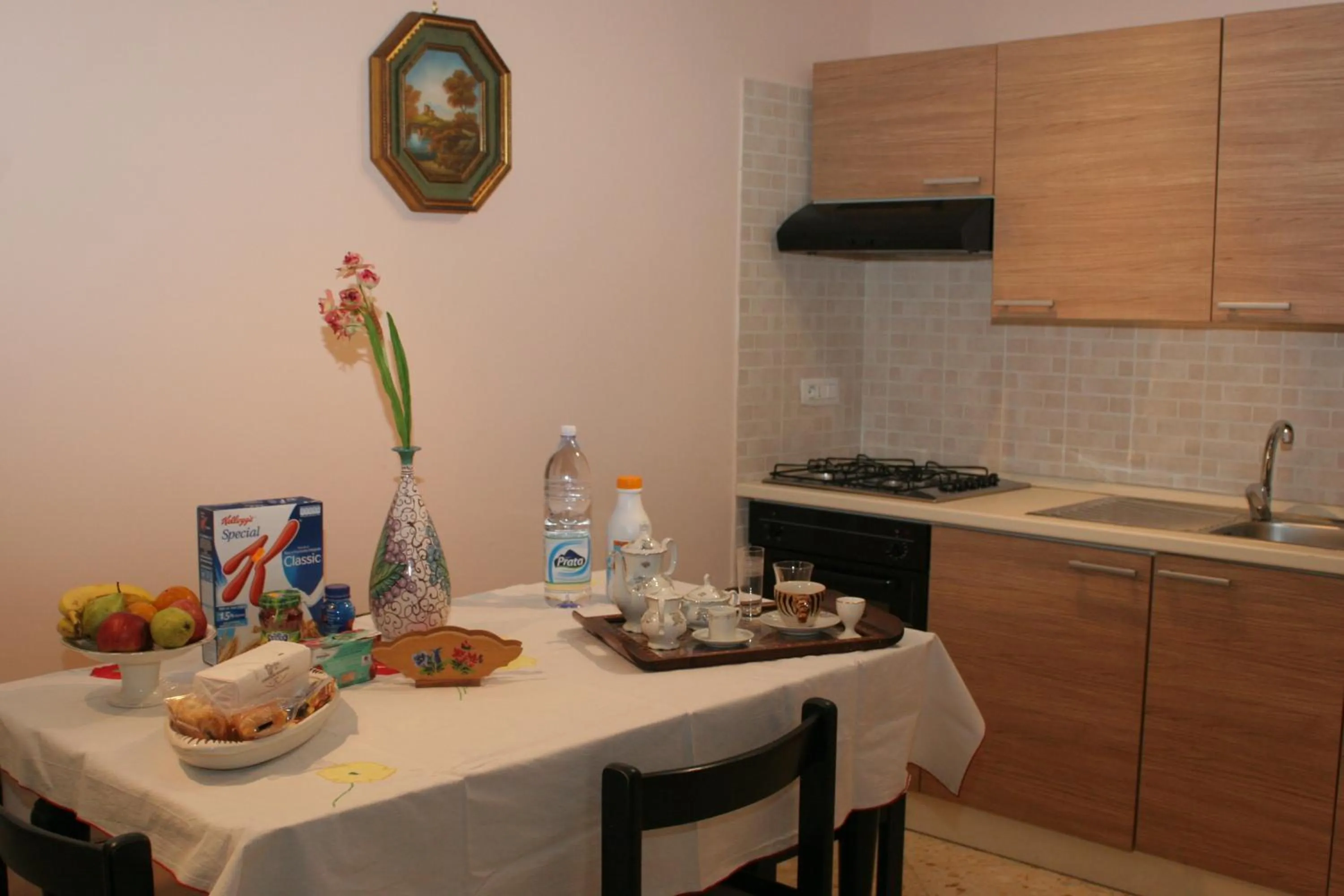 Kitchen or kitchenette in I Papiri B&B Aparthotel