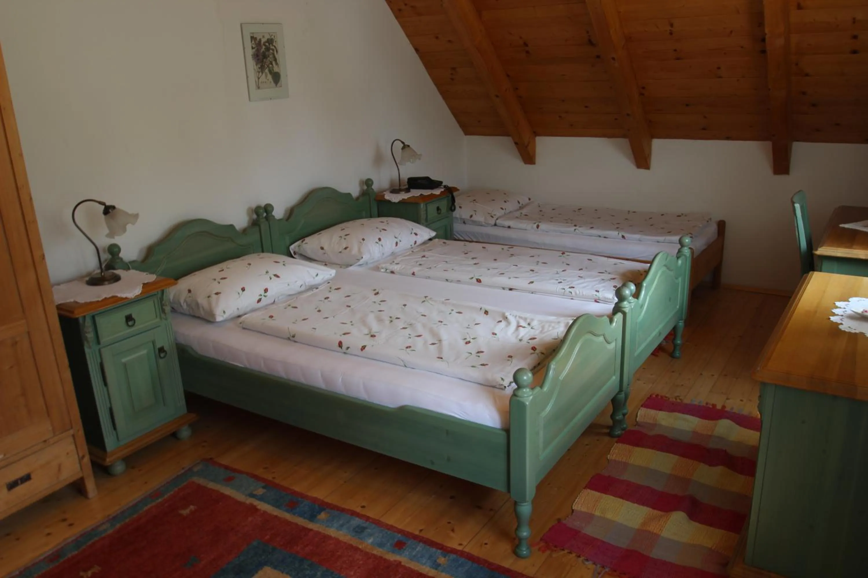 Photo of the whole room, Bed in Stoffbauer GmbH
