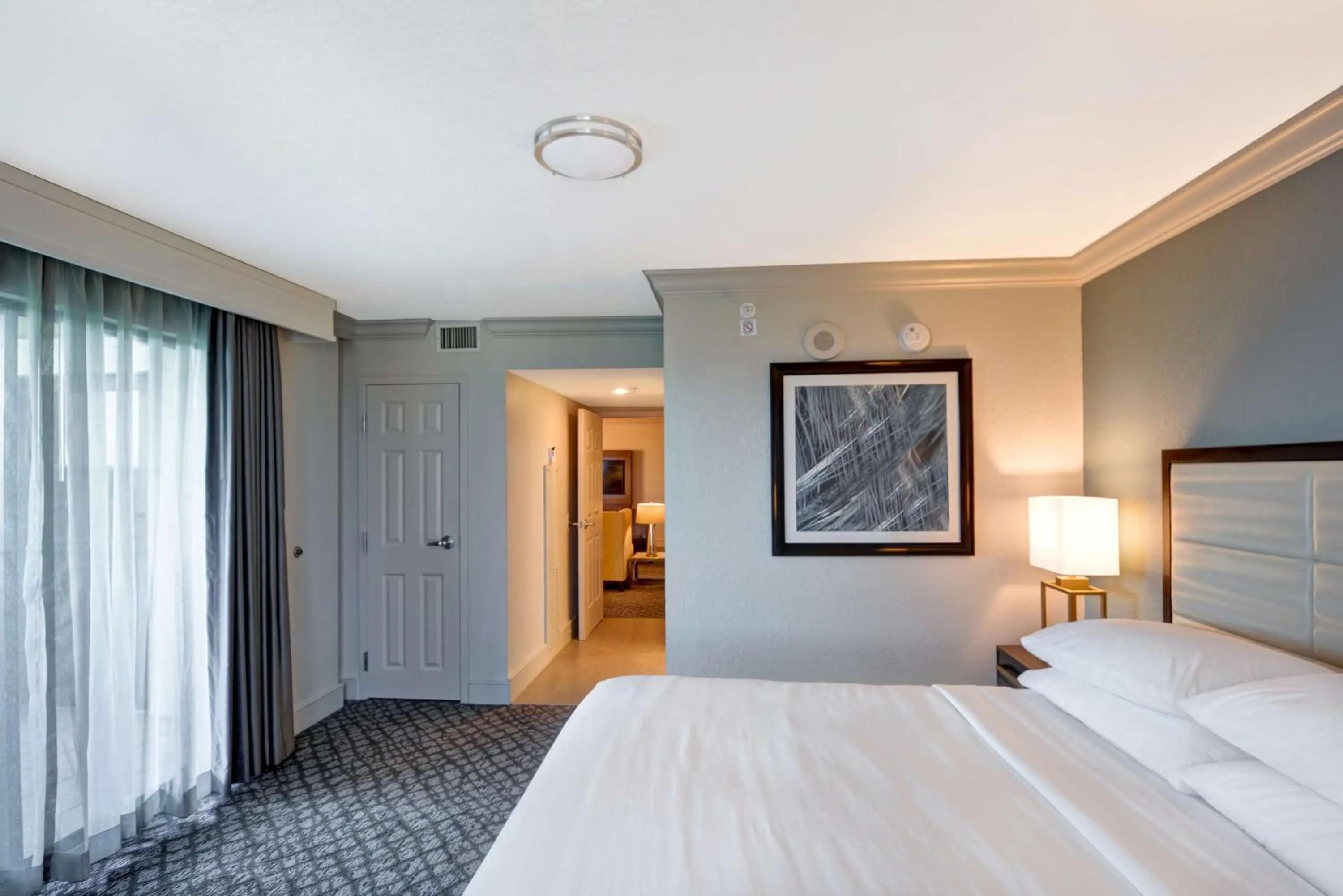 Photo of the whole room, Bed in Embassy Suites by Hilton Orlando Downtown