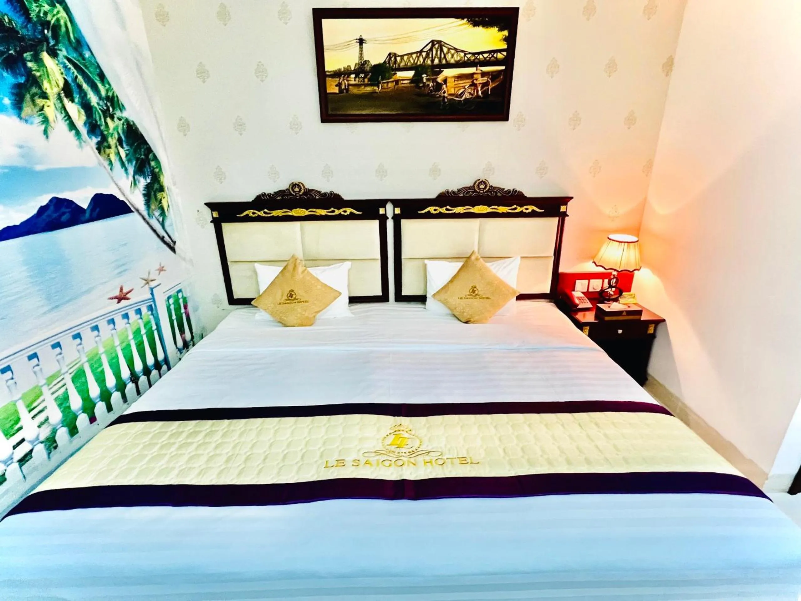 Bed in Le Saigon Hotel