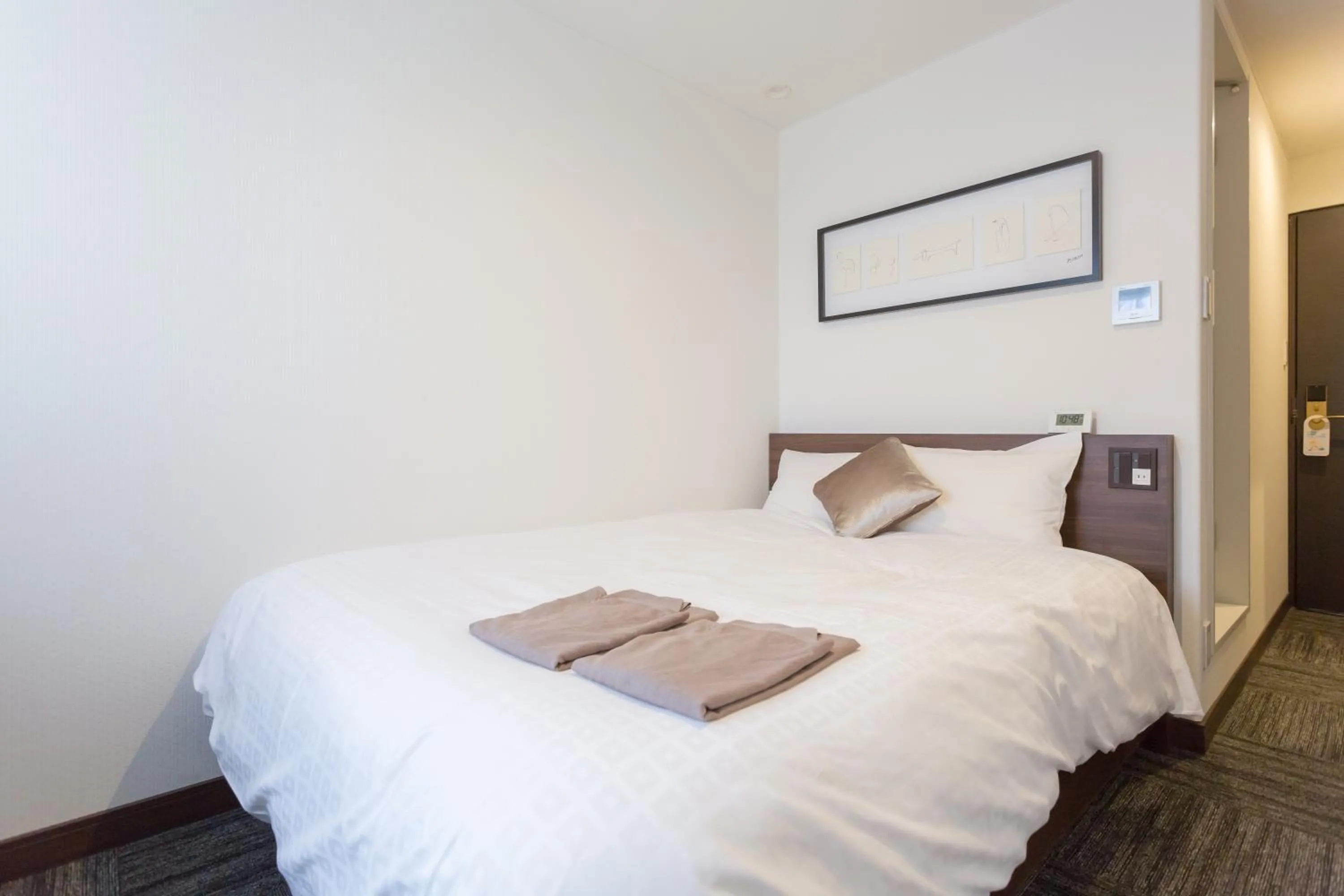 Bed in Shimizu City Hotel