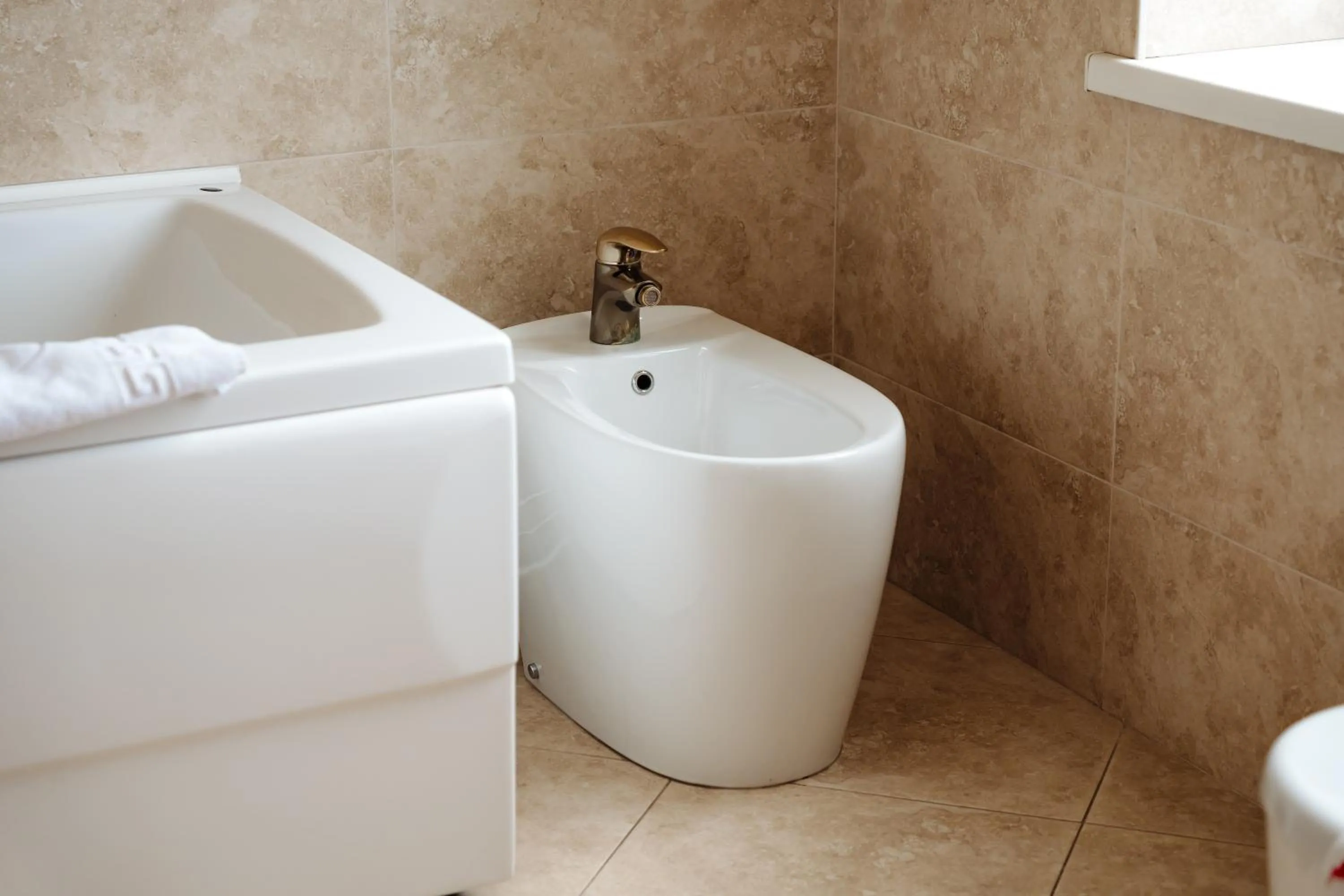 Bathroom in Maxim Pasha Hotel