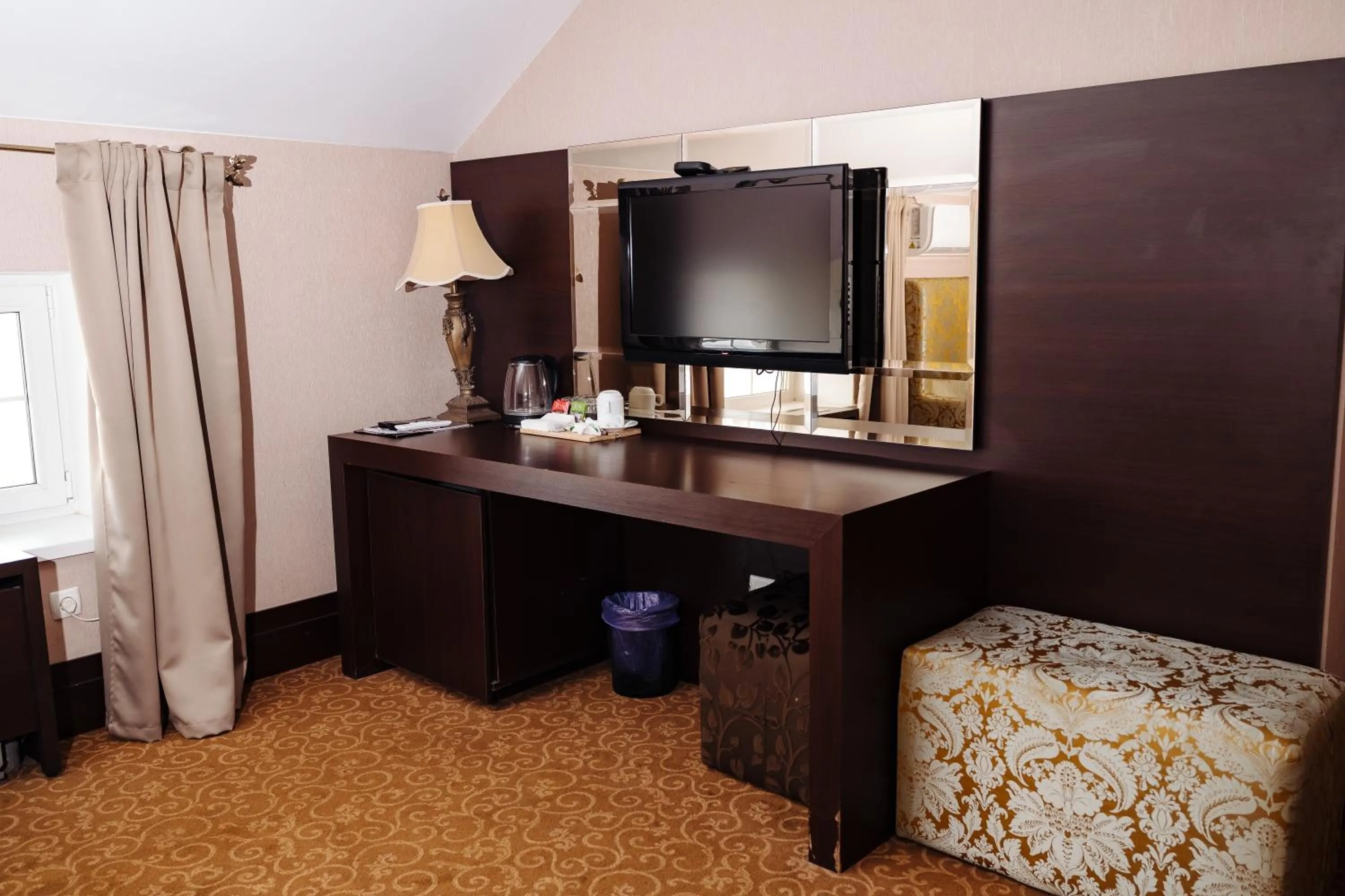 Bed in Maxim Pasha Hotel