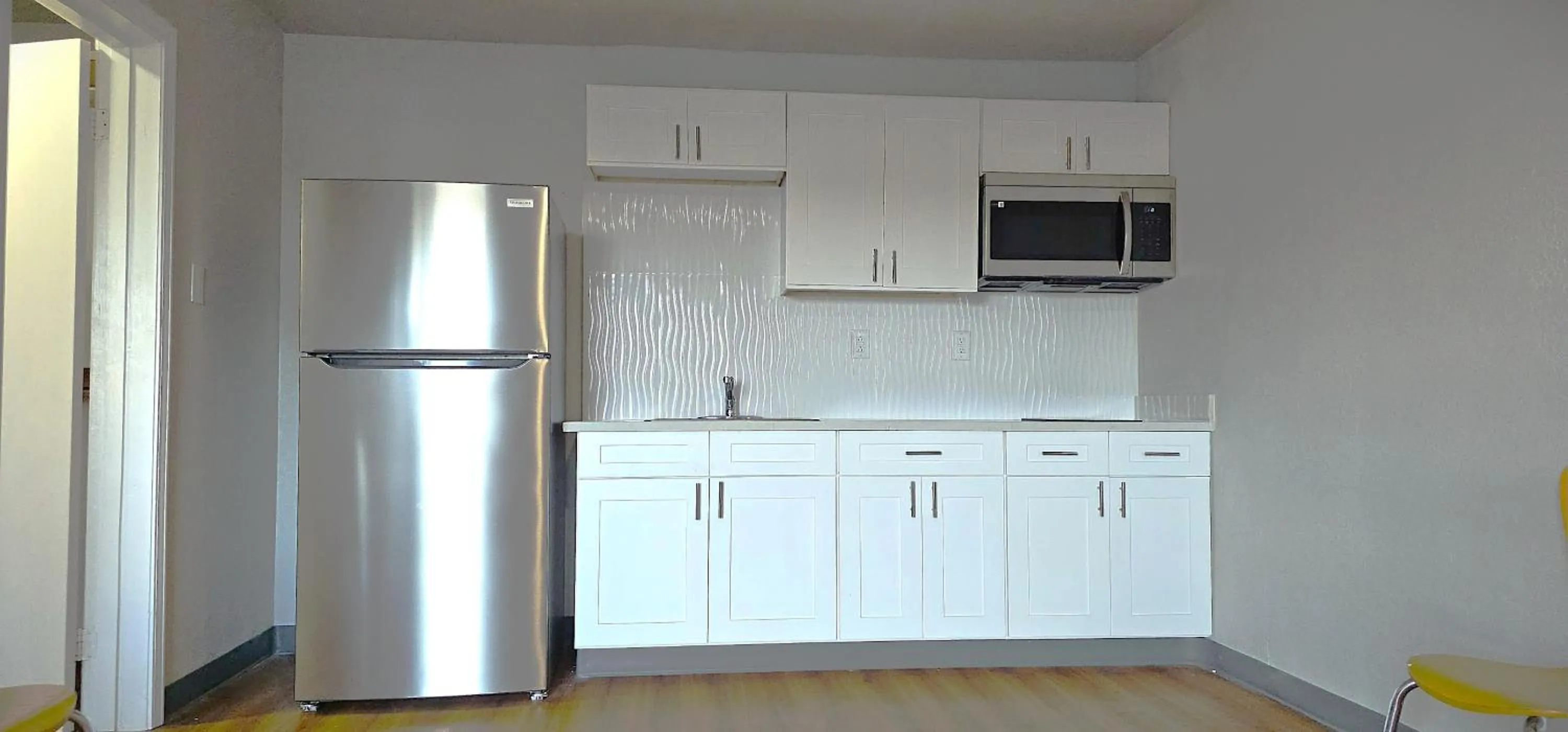 Kitchen or kitchenette in Avera Suites