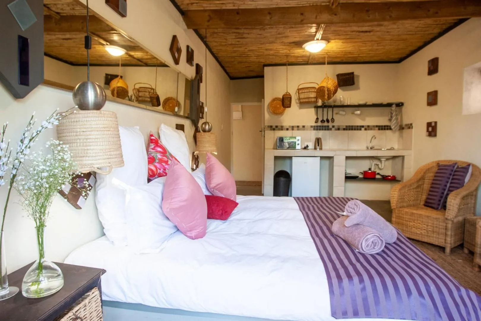 Photo of the whole room, Bed in Bedrock Guest Studios