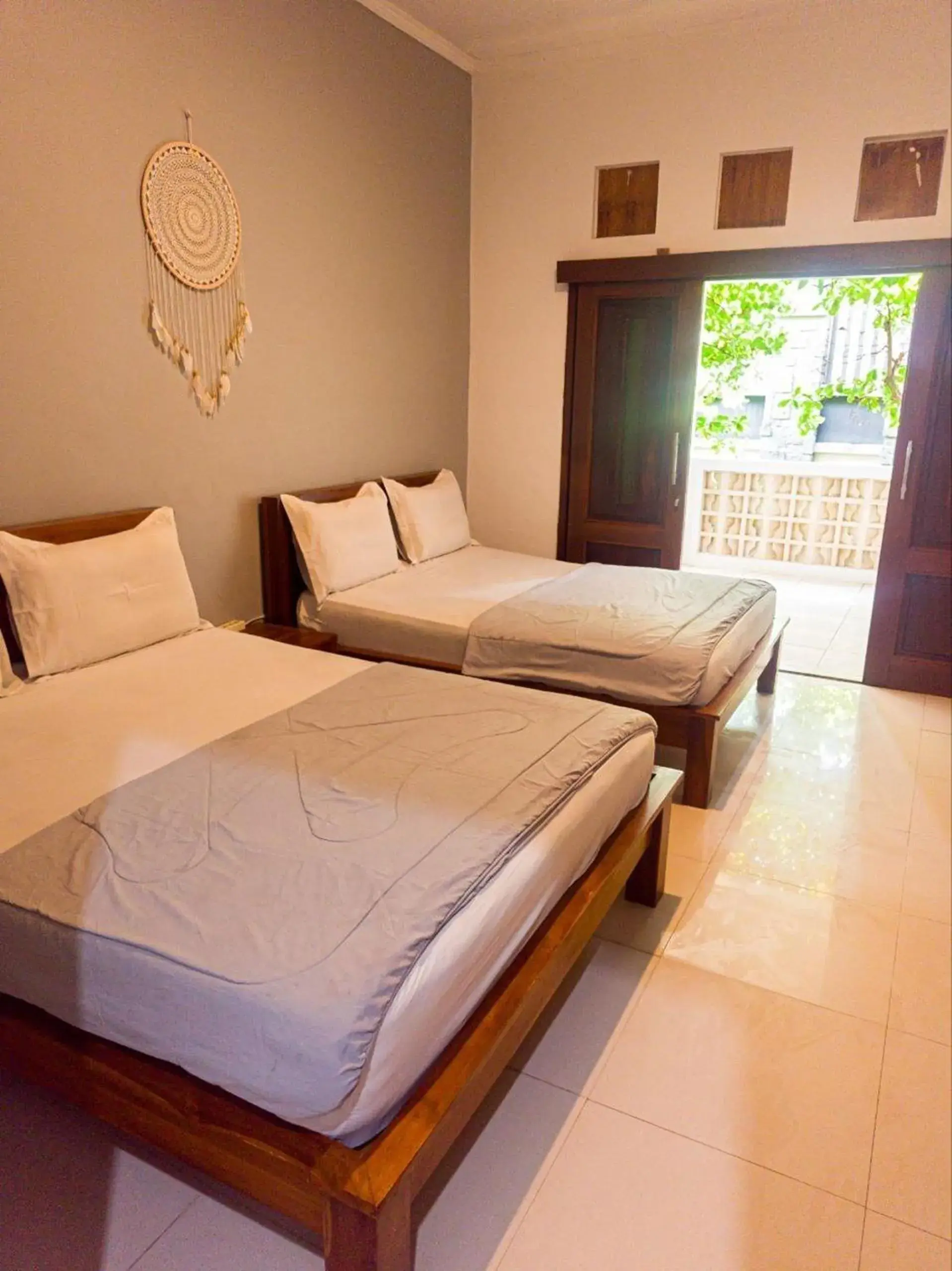 Bed in Ketapang Guesthouse Echo Beach Canggu Bed in Ketapang Guesthouse Echo Beach Canggu