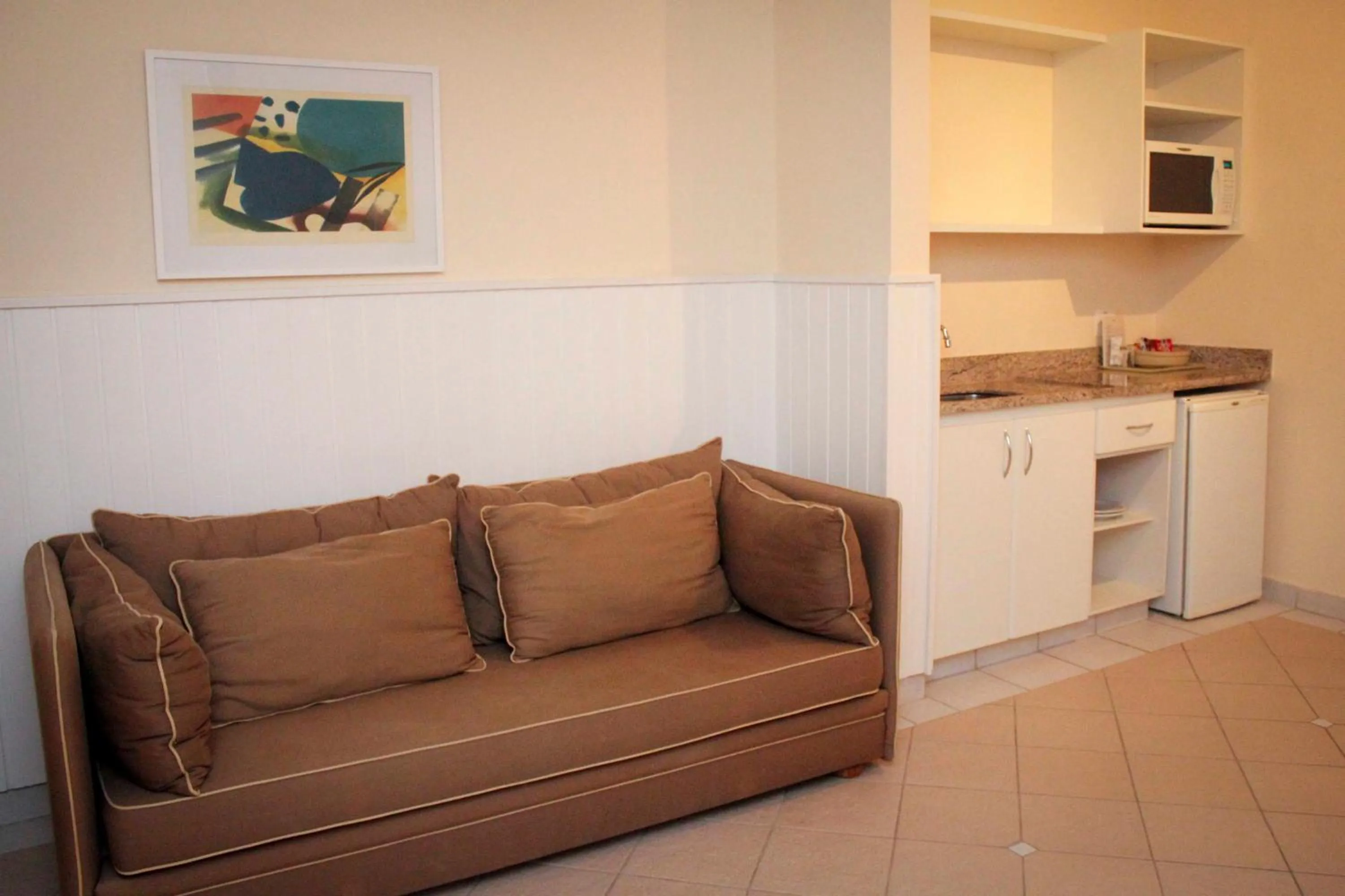 Kitchen or kitchenette in Vitória Hotel Residence NewPort