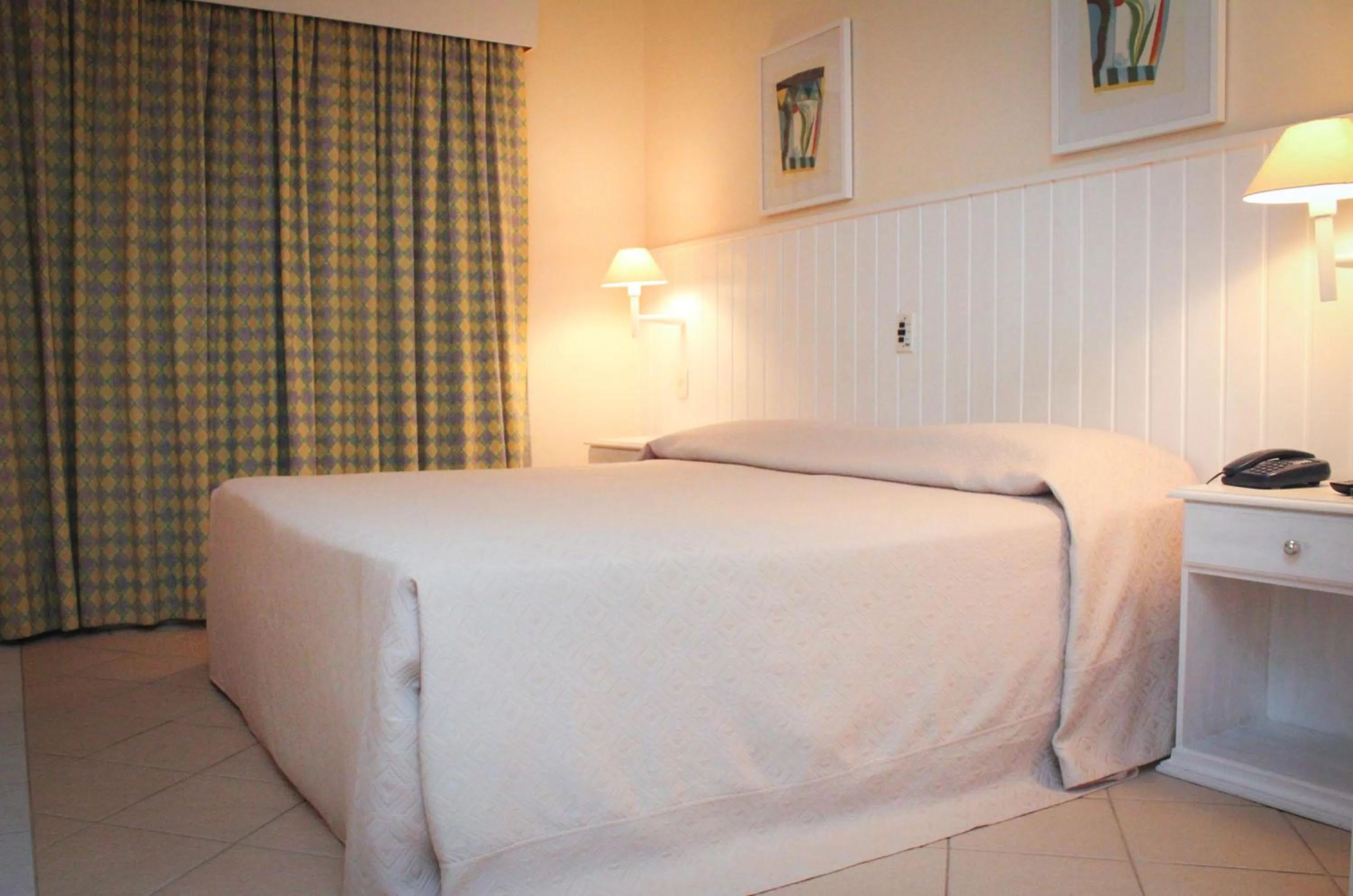 Bed in Vitória Hotel Residence NewPort