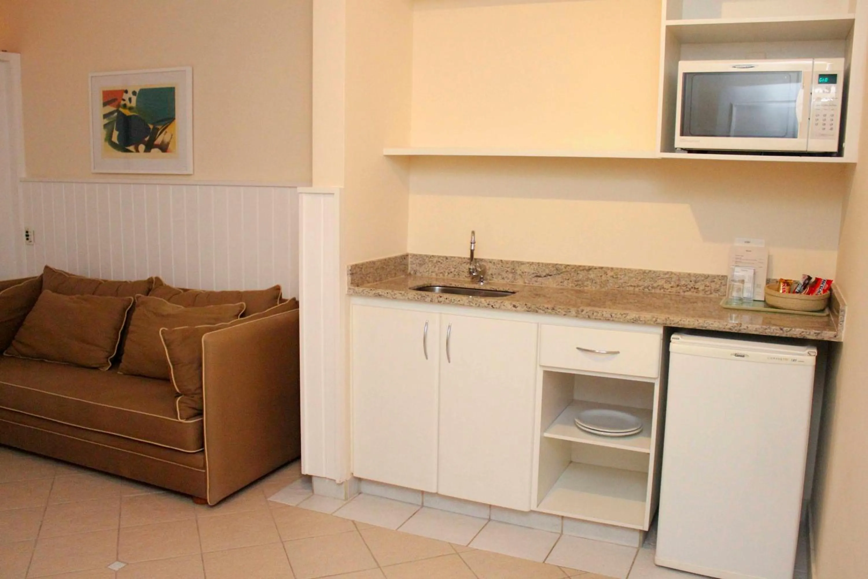 Kitchen or kitchenette in Vitória Hotel Residence NewPort
