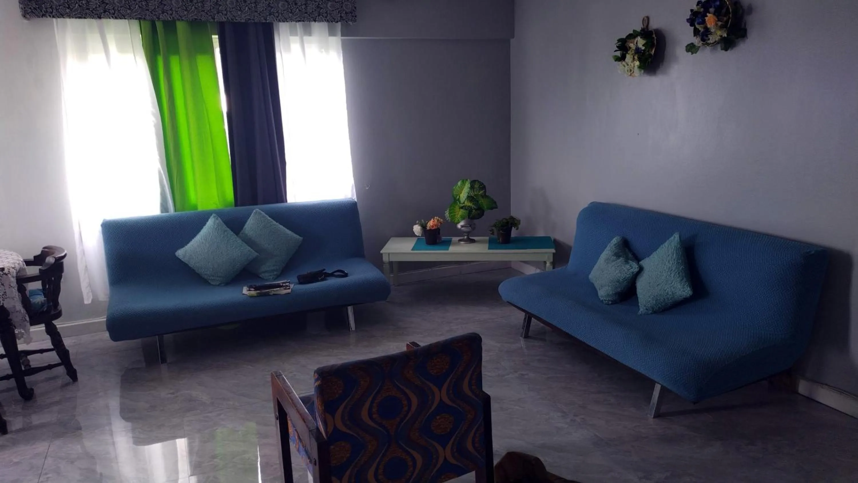Living room in Beach-side condos at Turtle Beach Towers