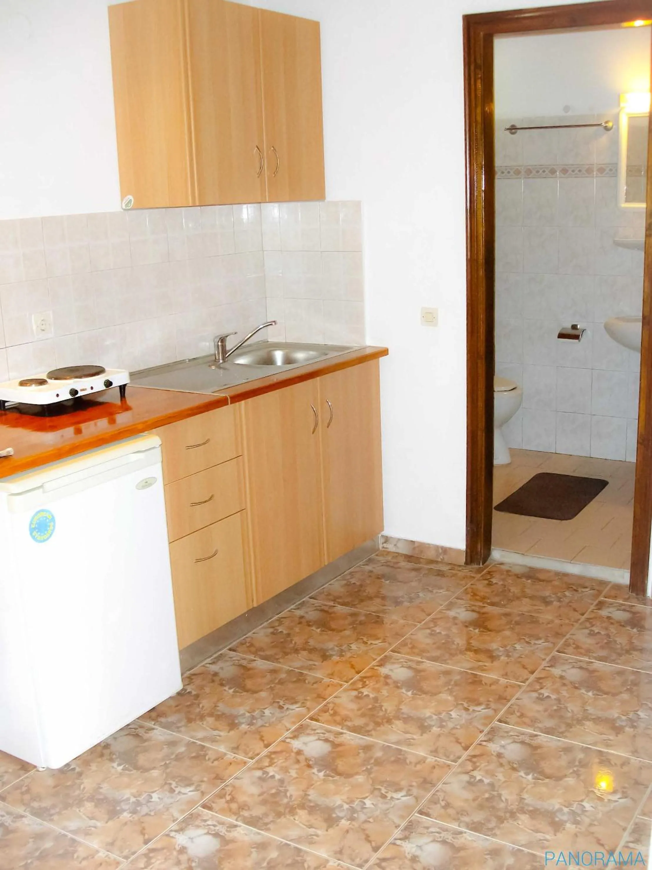 Kitchen or kitchenette in Panorama apartments