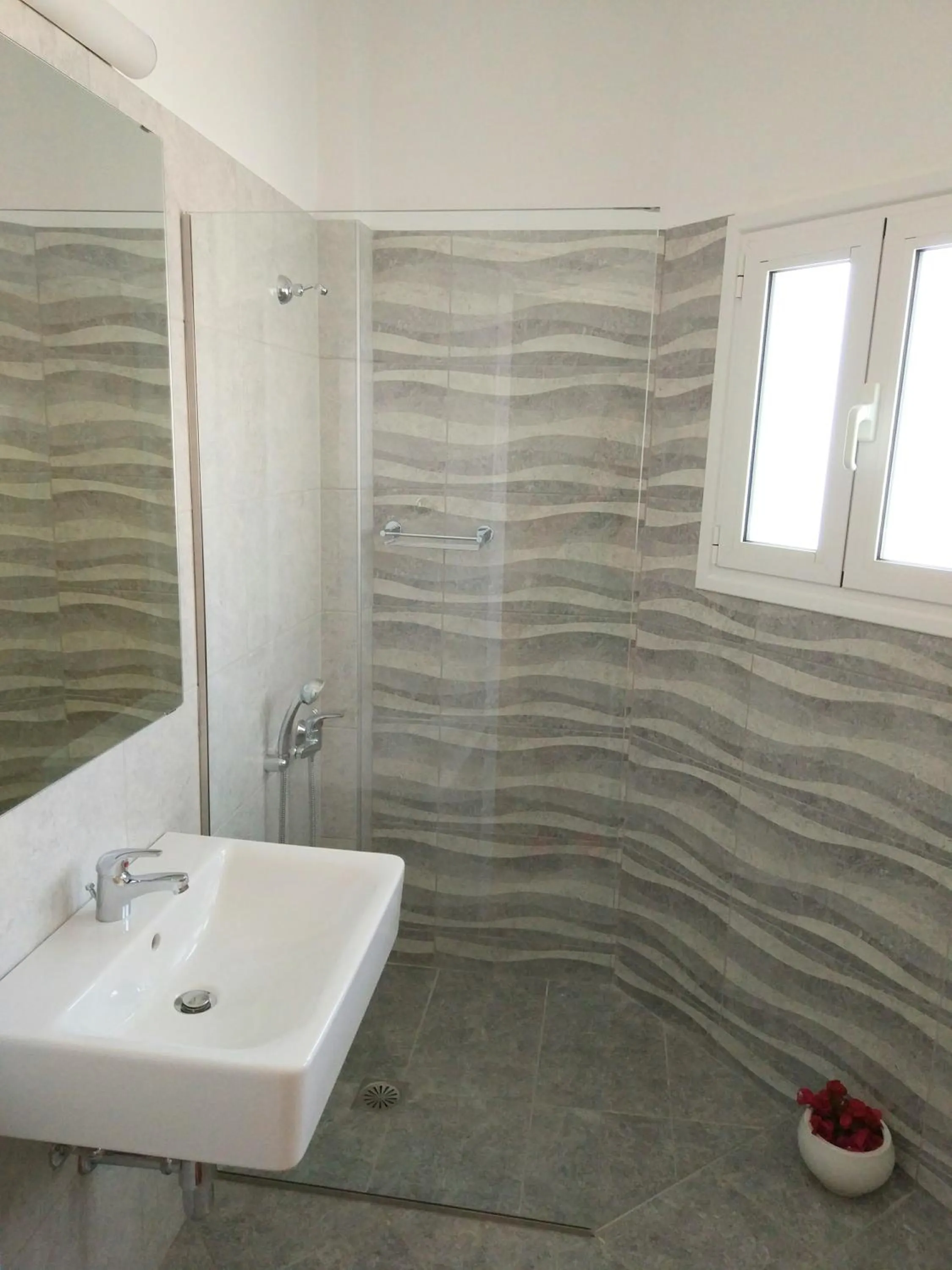 Bathroom in Melissa Apartments, Studios & Suites