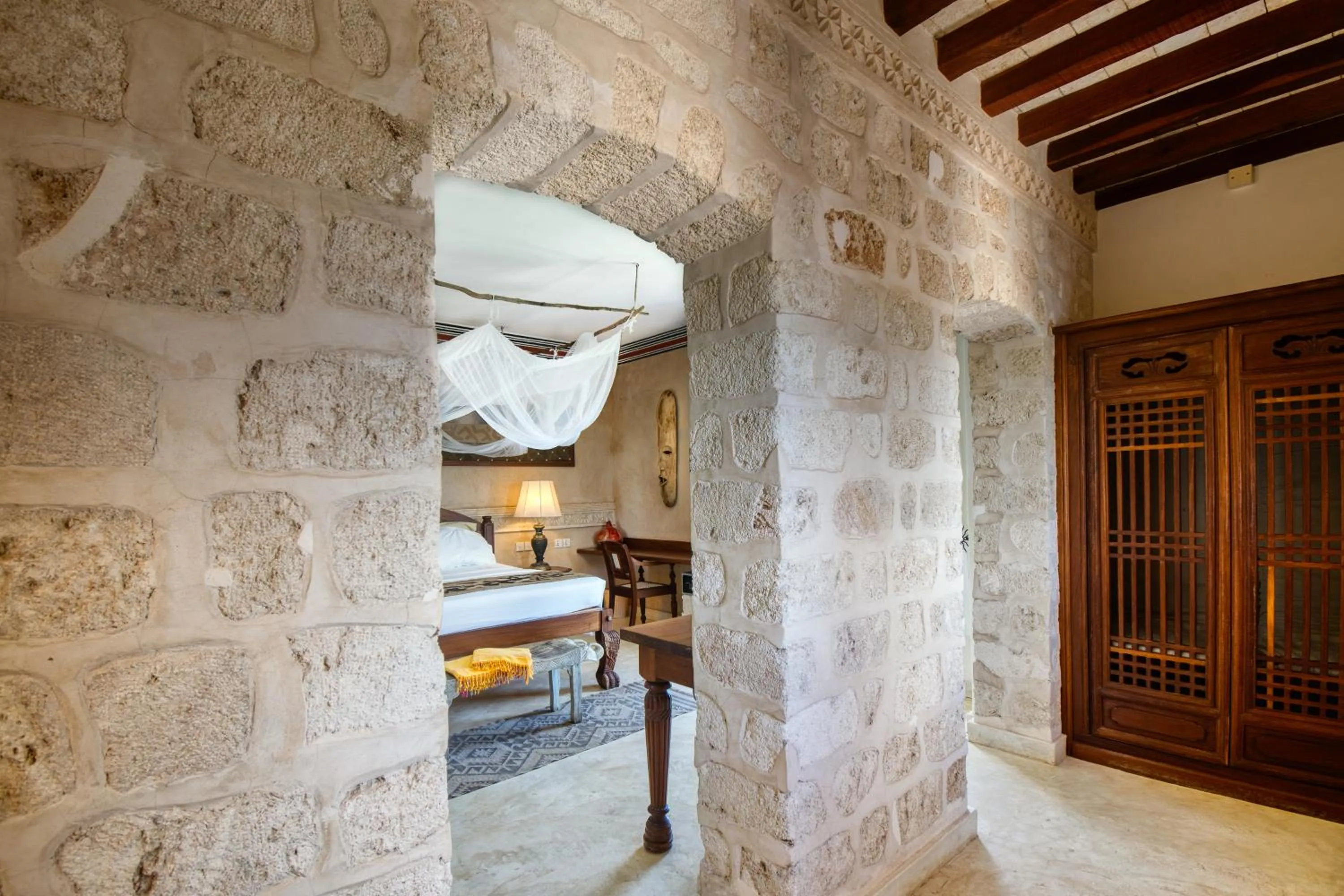 Bed in The Charming Lonno Lodge Watamu