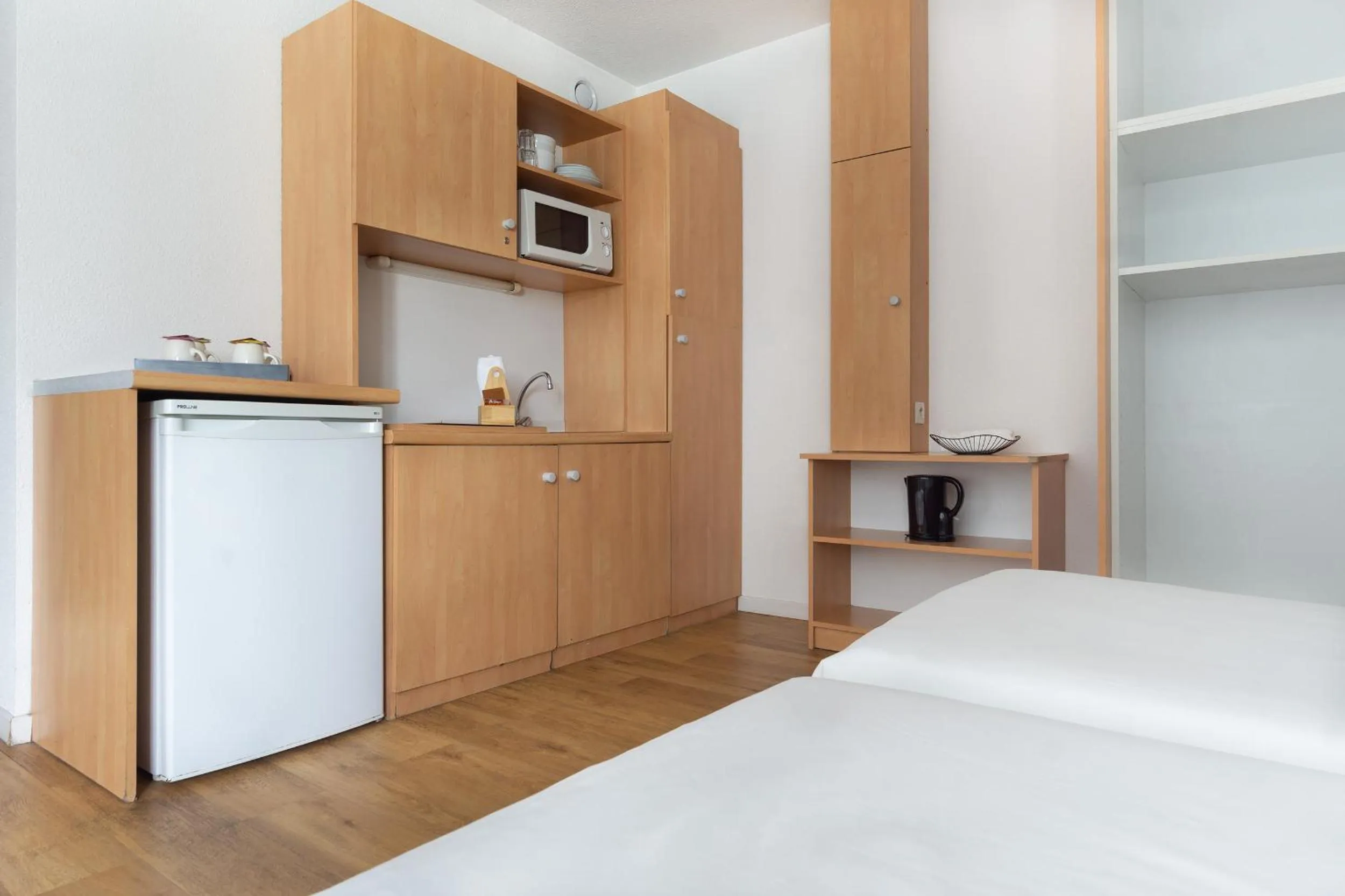 Kitchen or kitchenette, Bed in City Residence Access Strasbourg