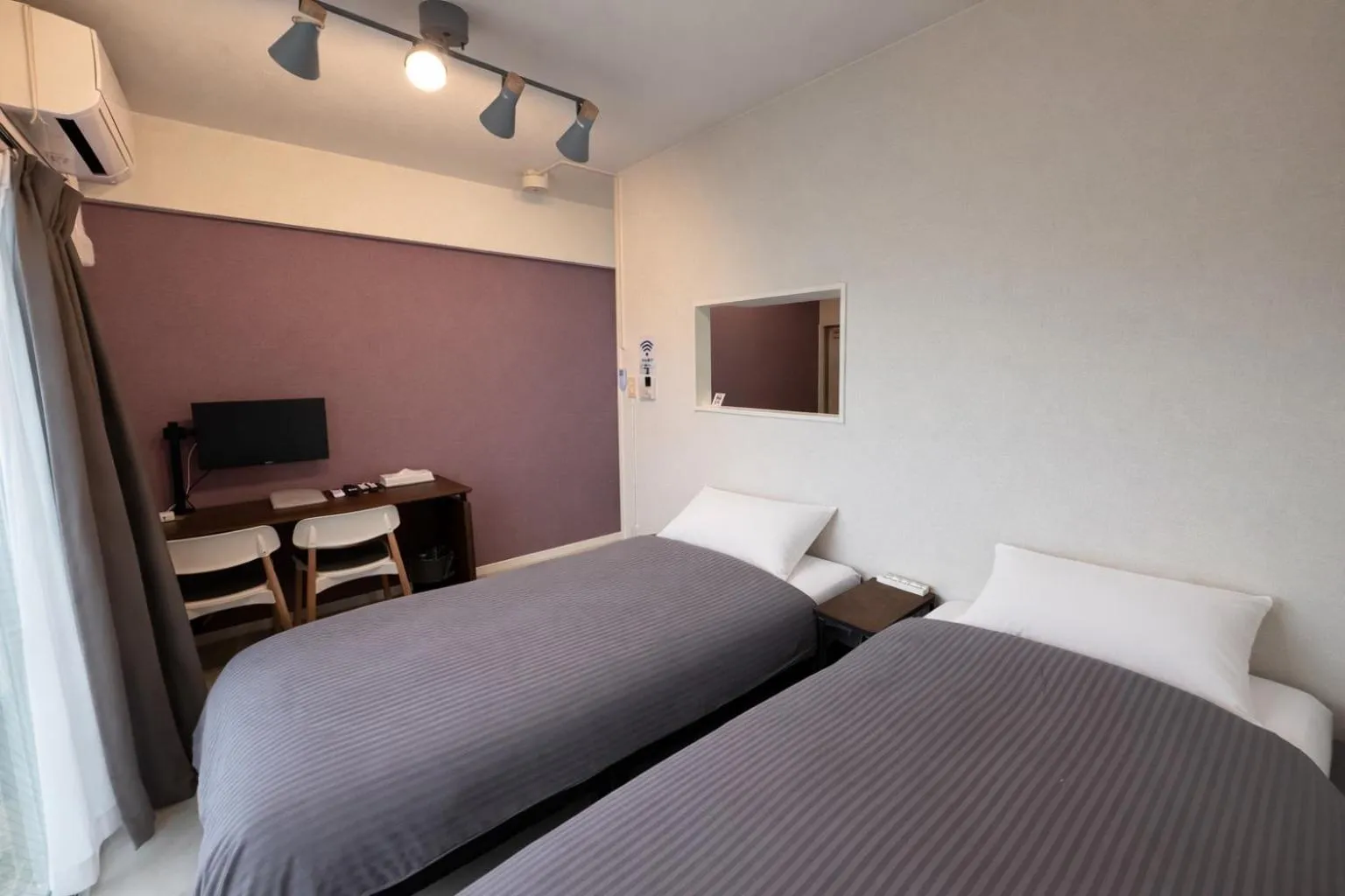 Bedroom, Bed in Condominium GOLF GOLF Tsuboya