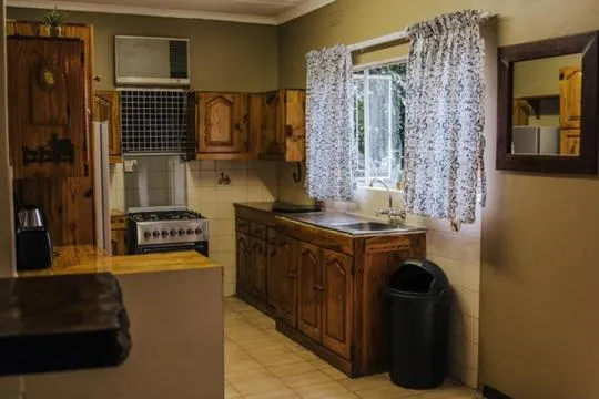 Kitchen or kitchenette in Casa Leitao Lodge
