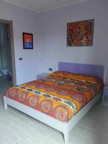 Bed in L'arcobaleno di Chia CIN IT11101CE