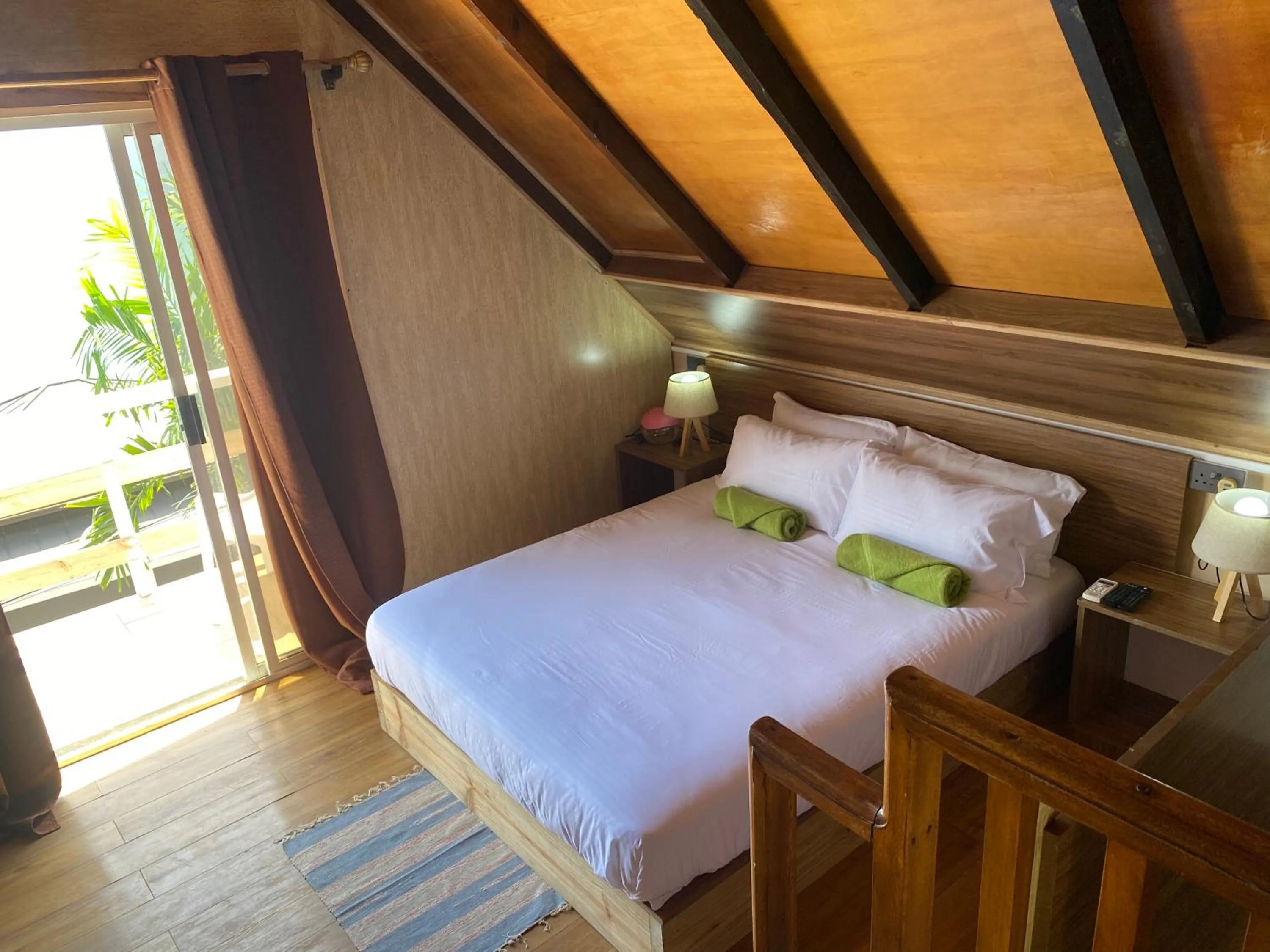 Bed in Mouggae Blues Villas