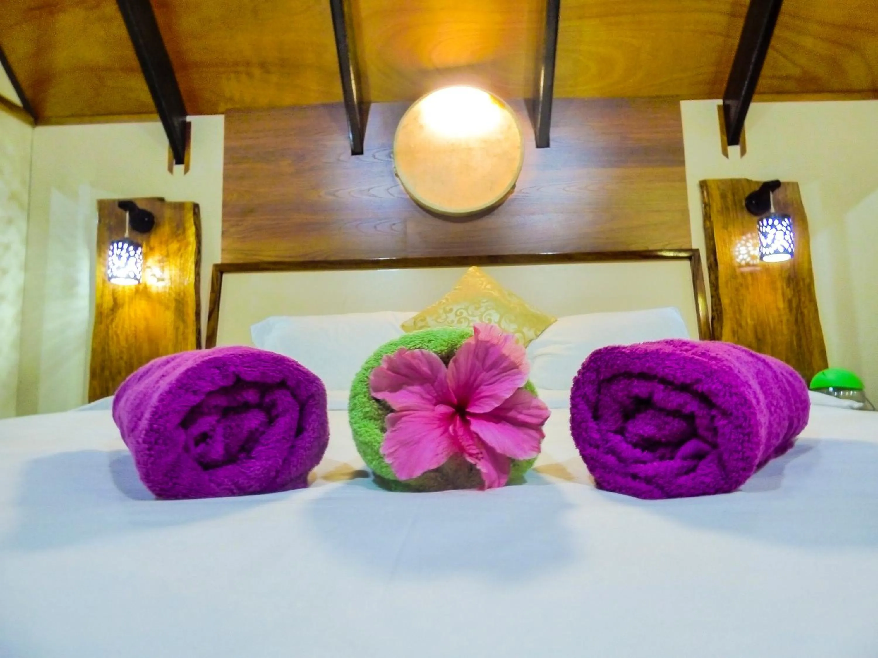 Bed in Mouggae Blues Villas