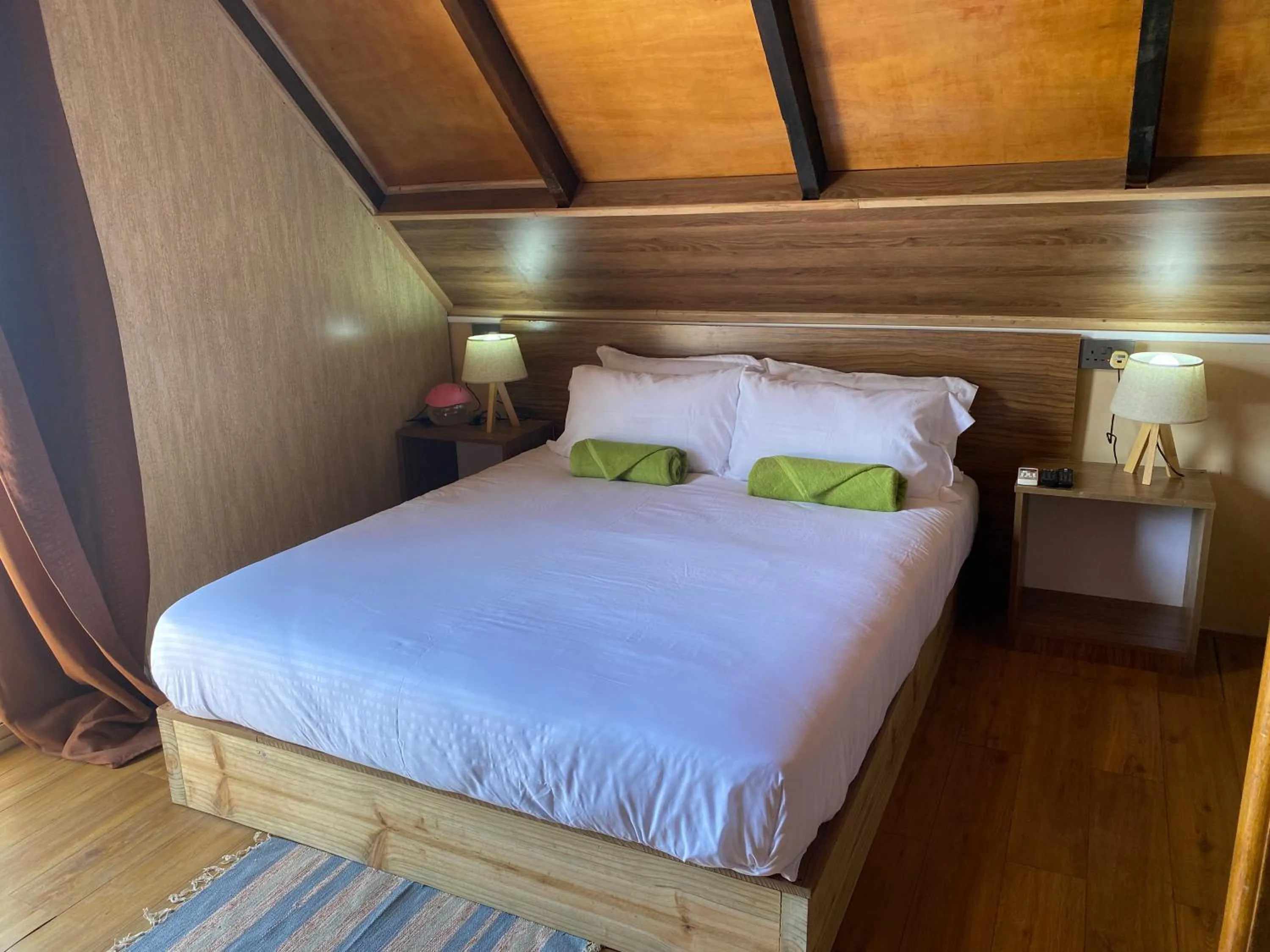 Bed in Mouggae Blues Villas