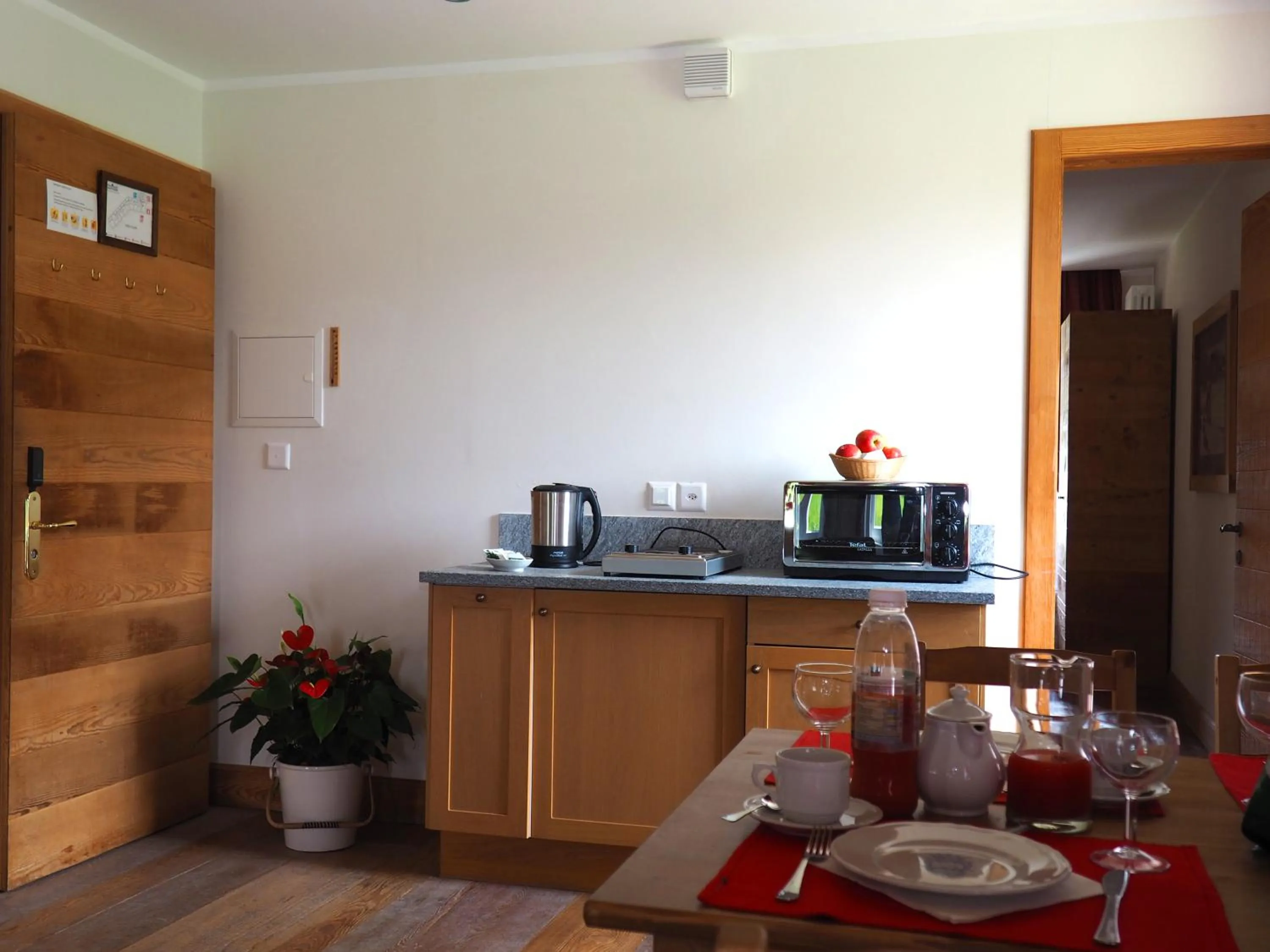 Kitchen or kitchenette in Maloja Palace Suites CO2-Neutral