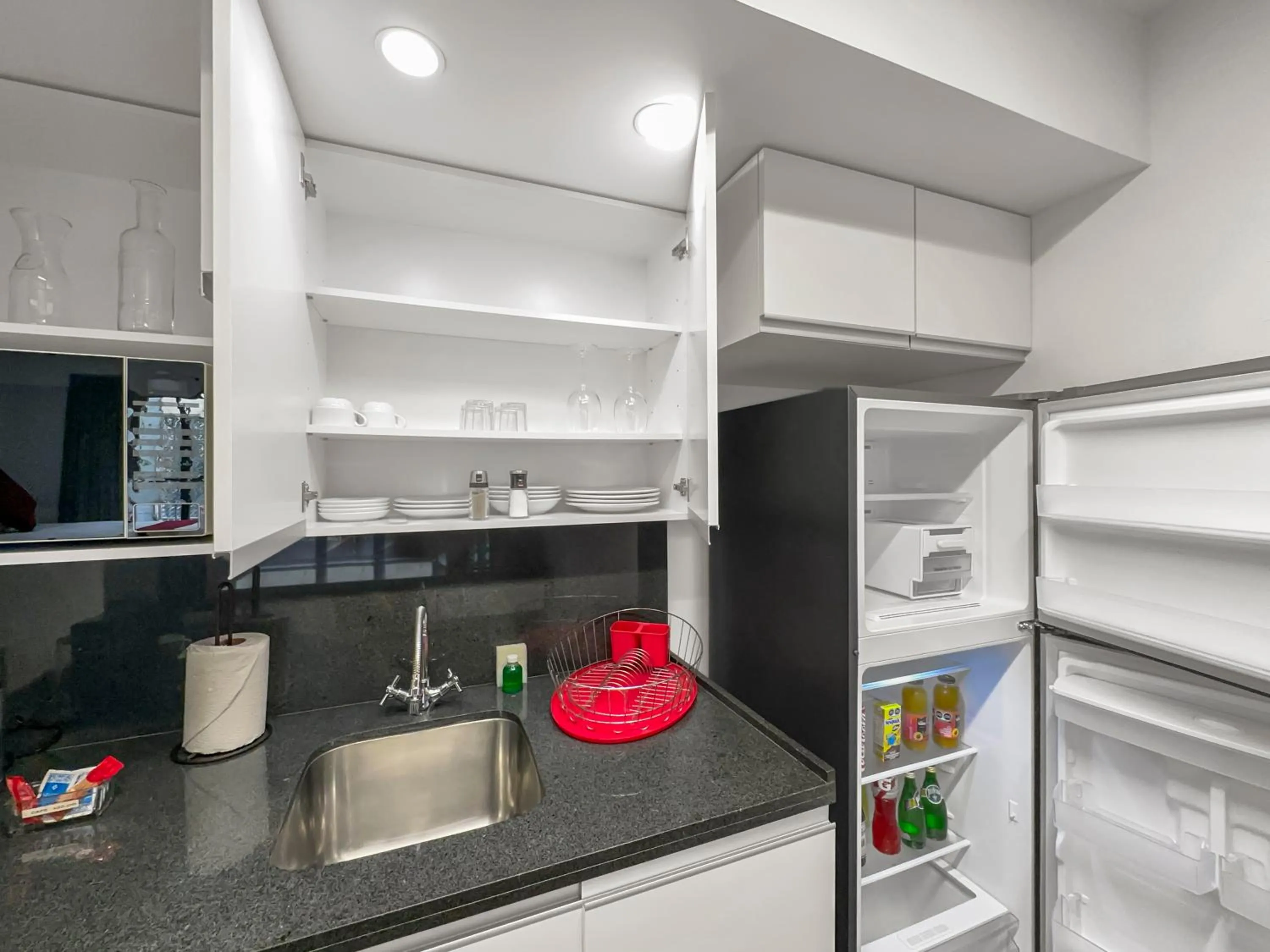 Kitchen or kitchenette in Armonik Suites By Casanevo