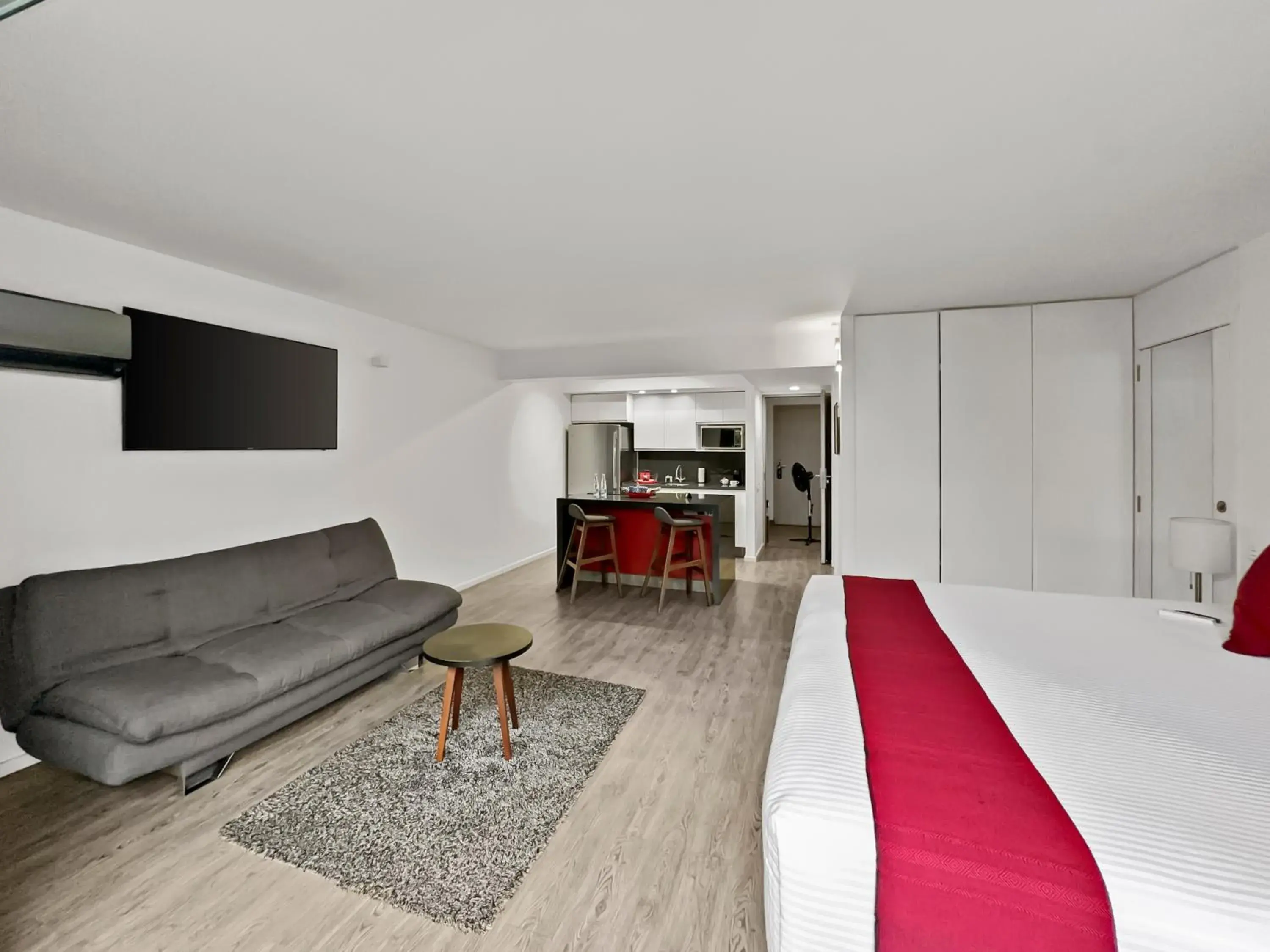 Living room, Bed in Armonik Suites By Casanevo Living room, Bed in Armonik Suites By Casanevo