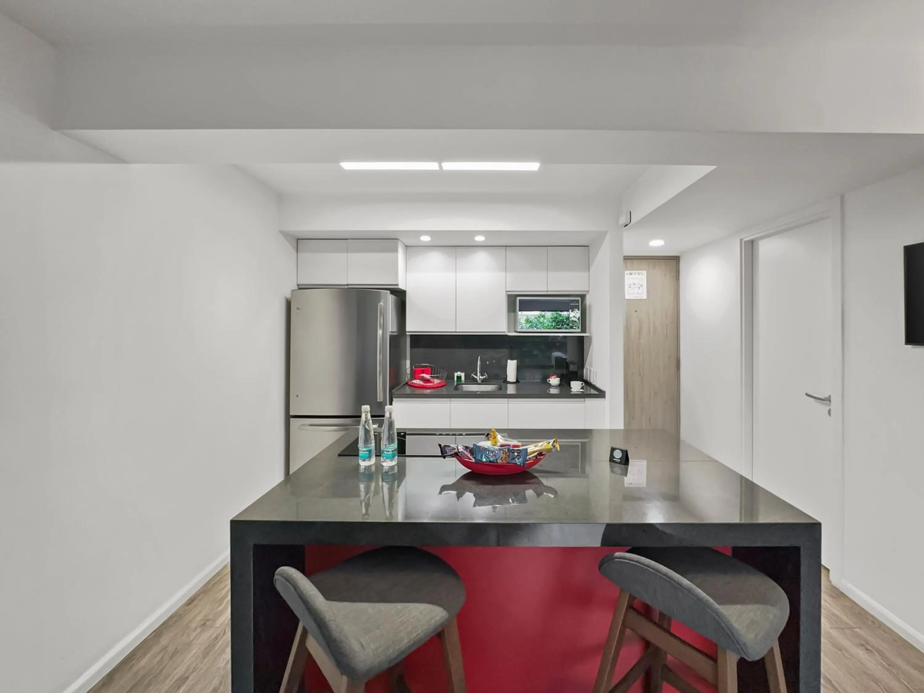 Kitchen or kitchenette in Armonik Suites By Casanevo