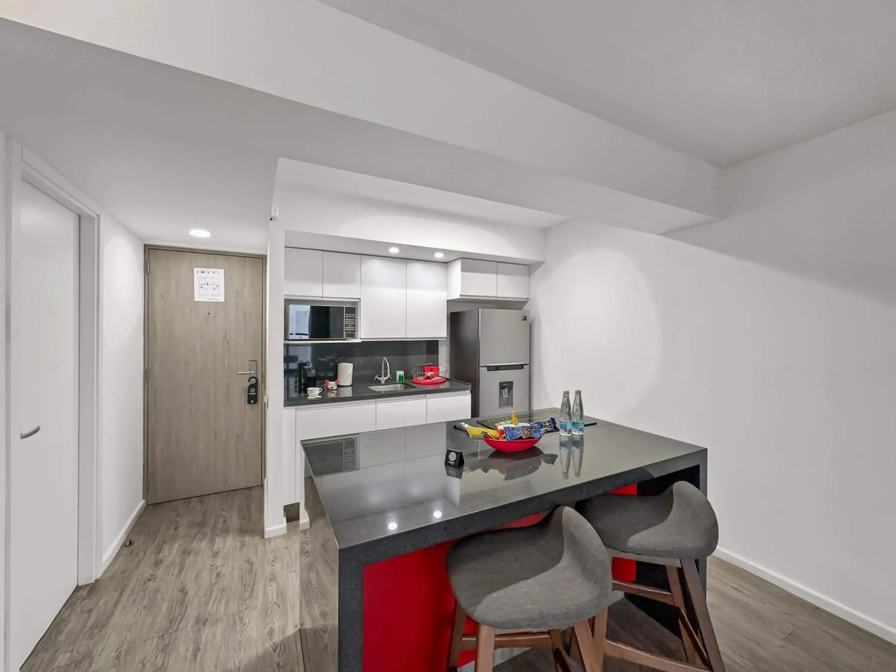 Kitchen or kitchenette in Armonik Suites By Casanevo