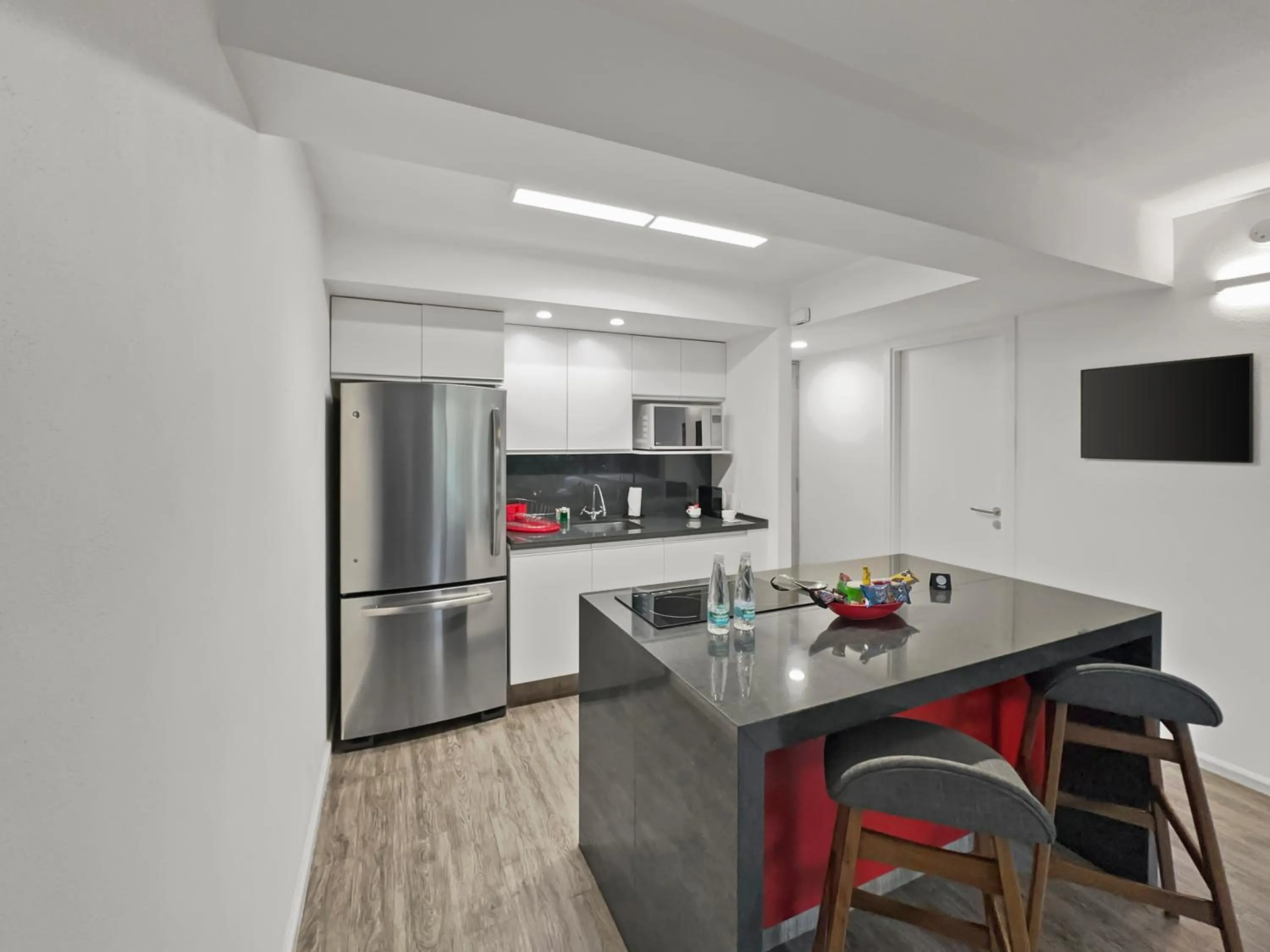 Kitchen or kitchenette in Armonik Suites By Casanevo