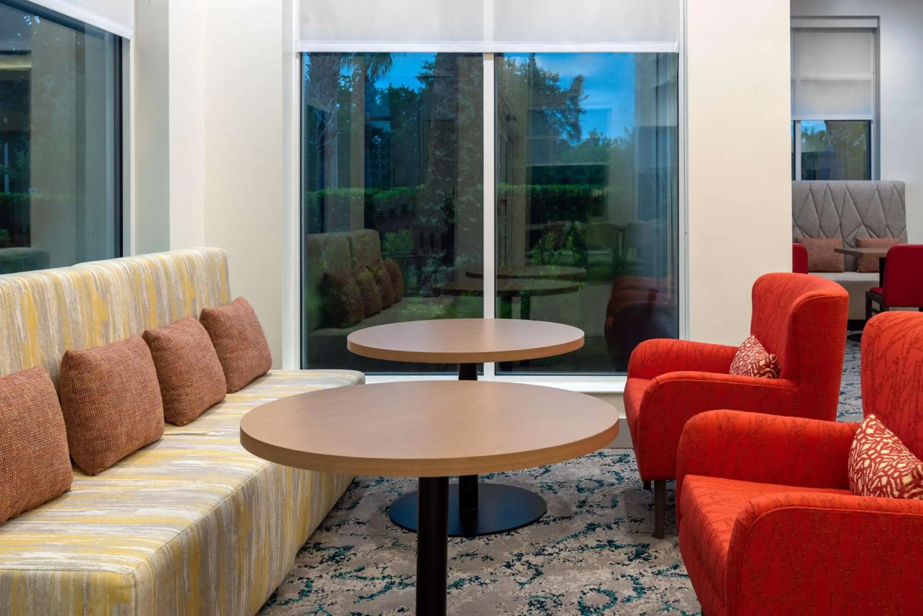 Lobby or reception in Hilton Garden Inn Orlando International Drive North Lobby or reception in Hilton Garden Inn Orlando International Drive North