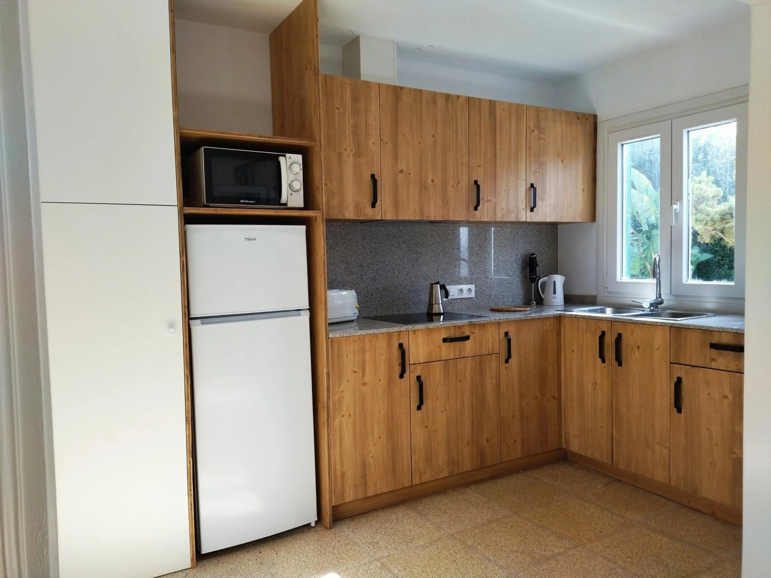 kitchen in Nure Cel Blau