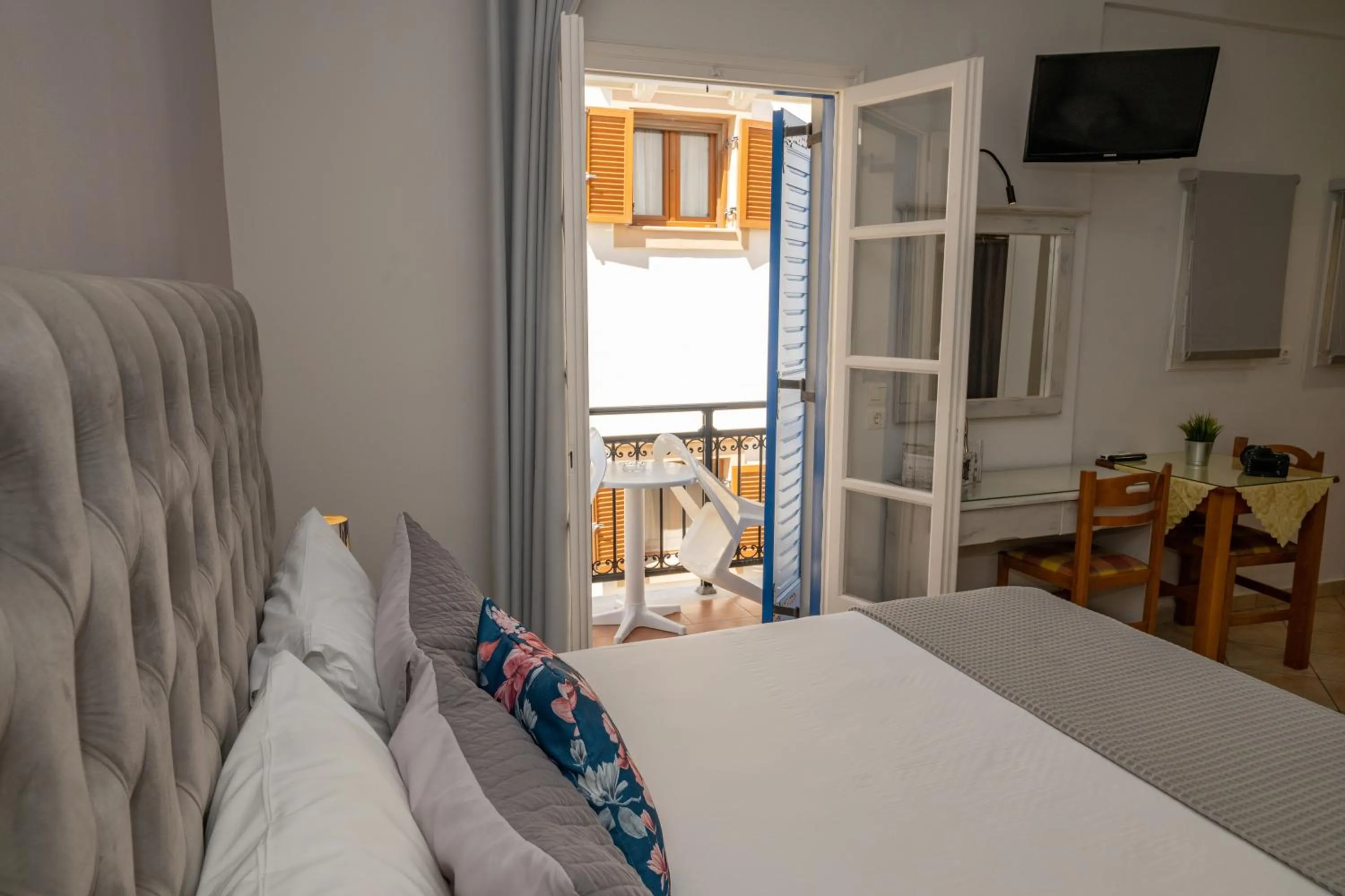 Bed in Katerina Roza Studios - Heartfelt Hospitality in the City